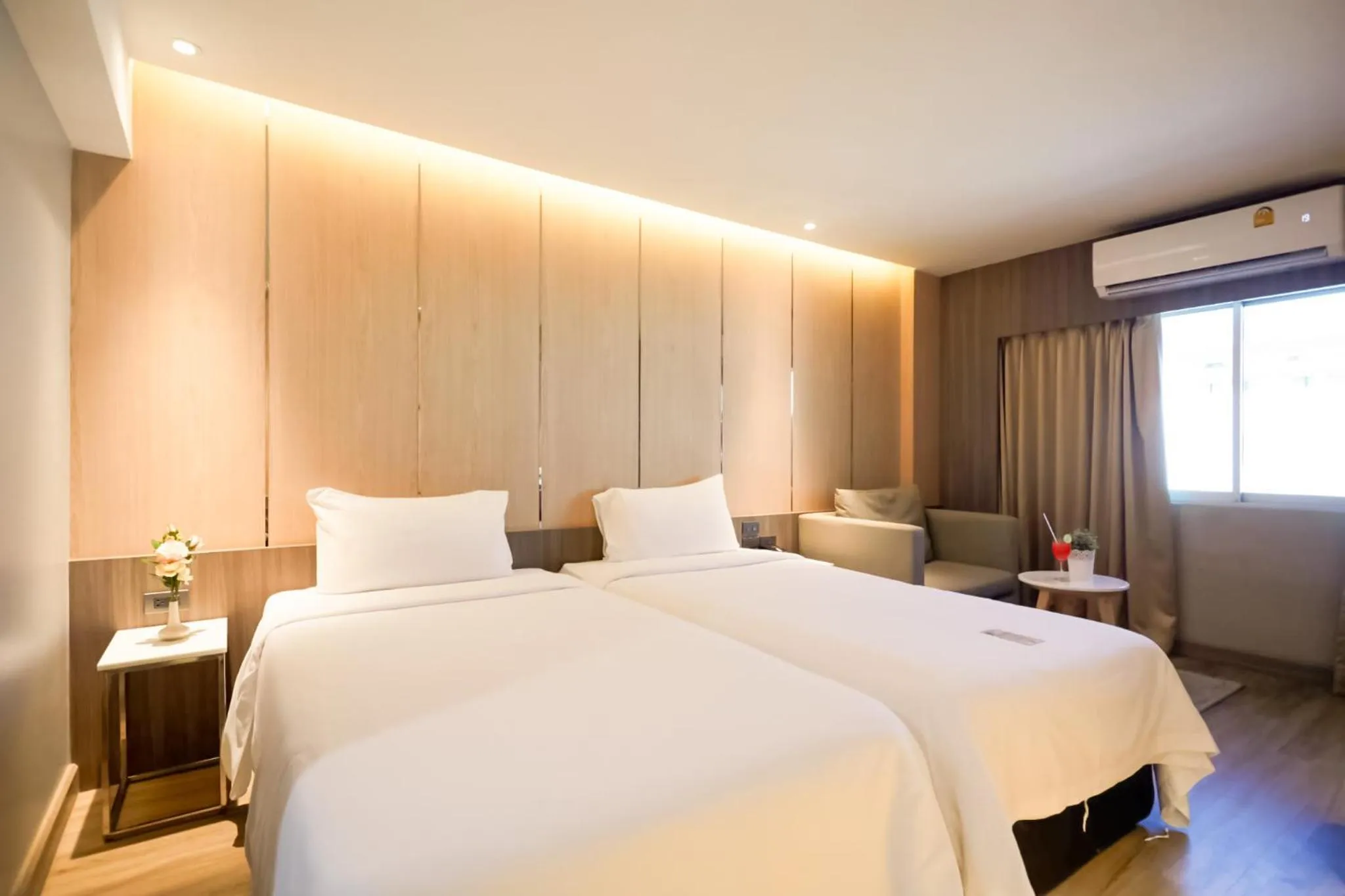 Bed in Golden City Rayong Hotel