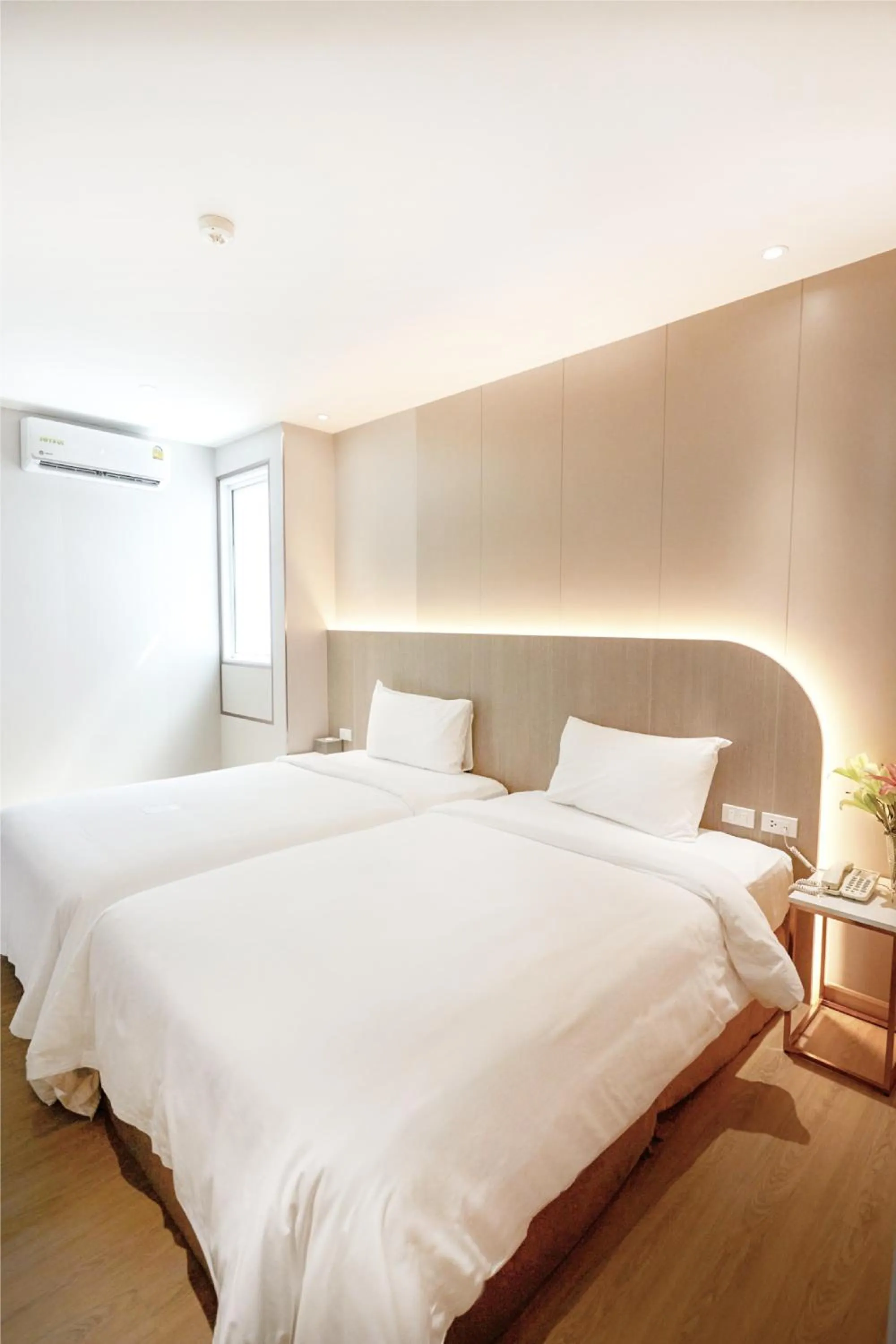 Bed in Golden City Rayong Hotel