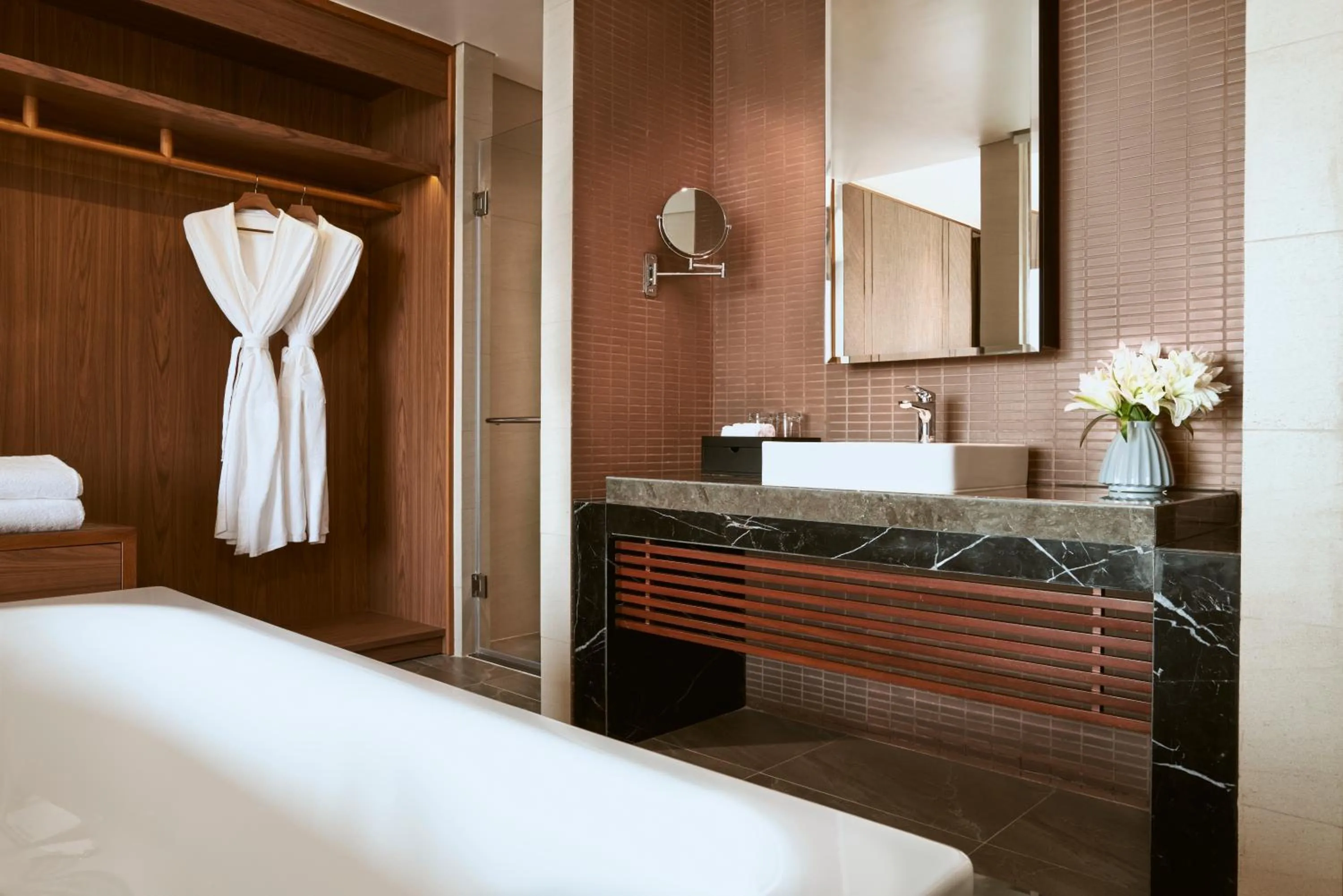 Bathroom, Bed in Mövenpick Villas & Residences Phu Quoc