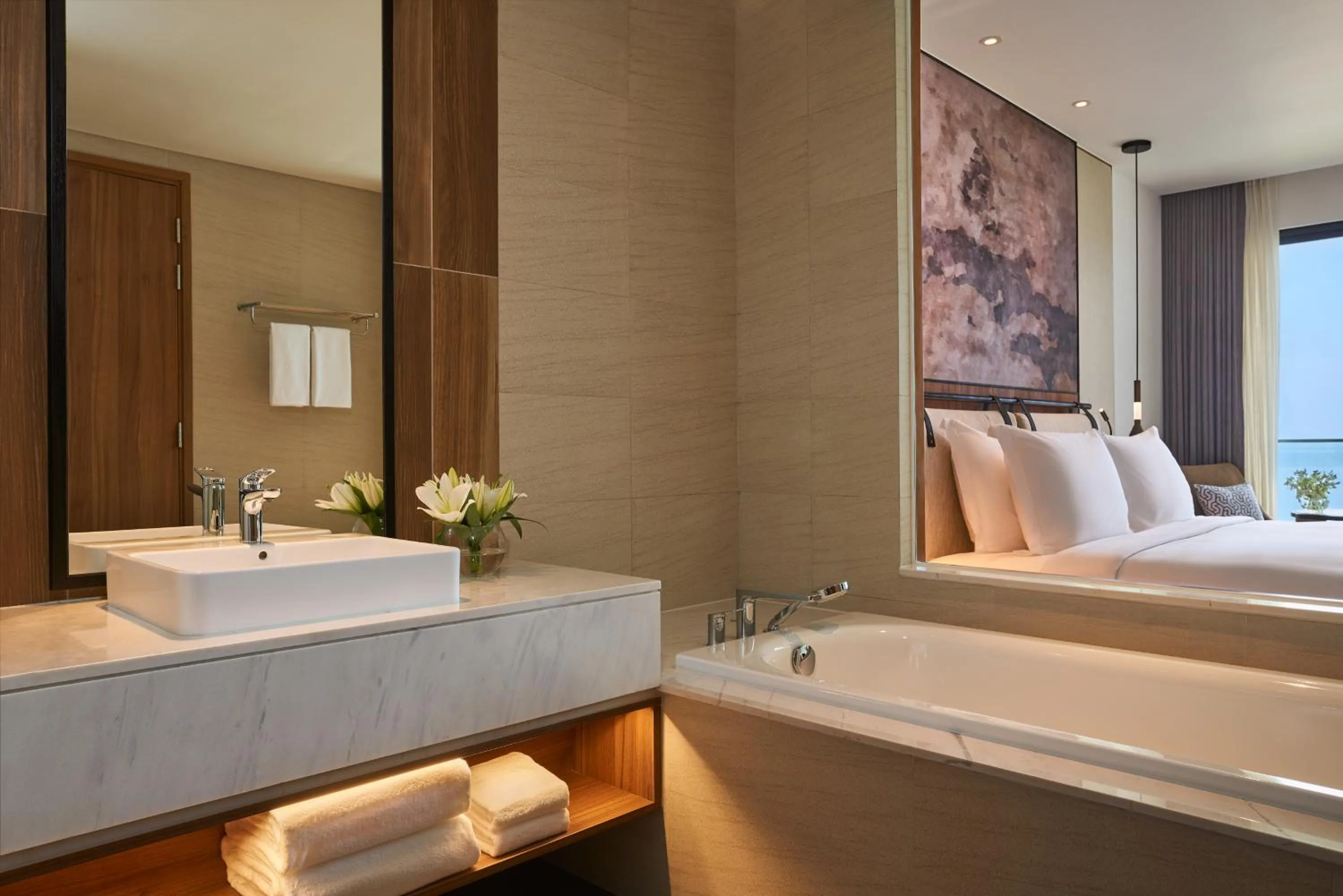 Bathroom, Bed in Mövenpick Resort Waverly Phu Quoc