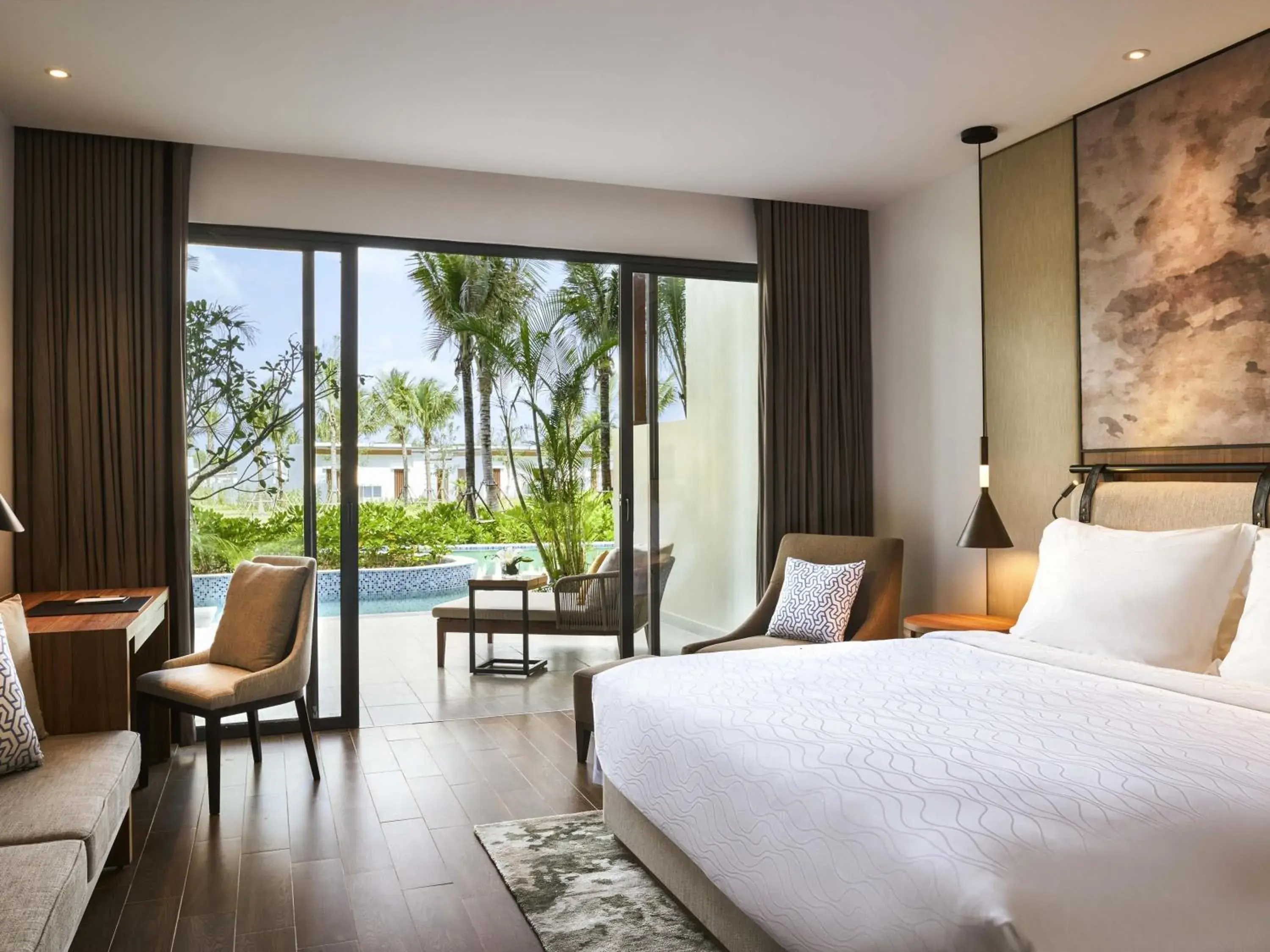 Superior King Room with Direct Pool Access in Mövenpick Resort Waverly Phu Quoc Superior King Room with Direct Pool Access in Mövenpick Resort Waverly Phu Quoc