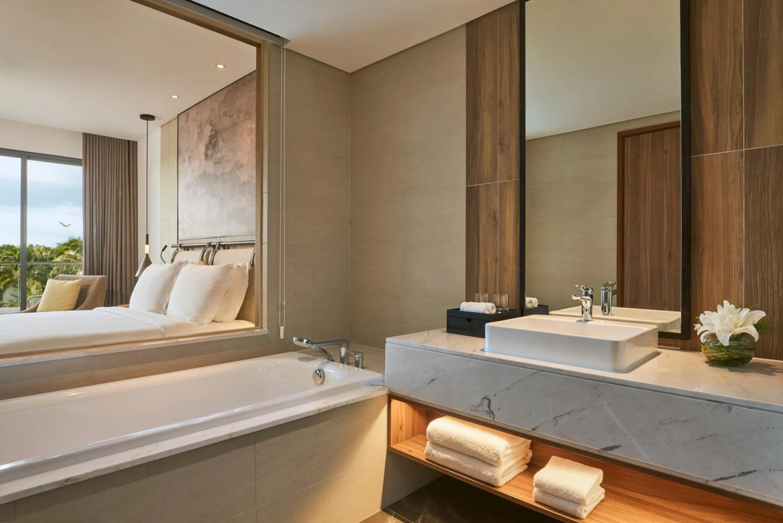 Bathroom, Bed in Mövenpick Resort Waverly Phu Quoc