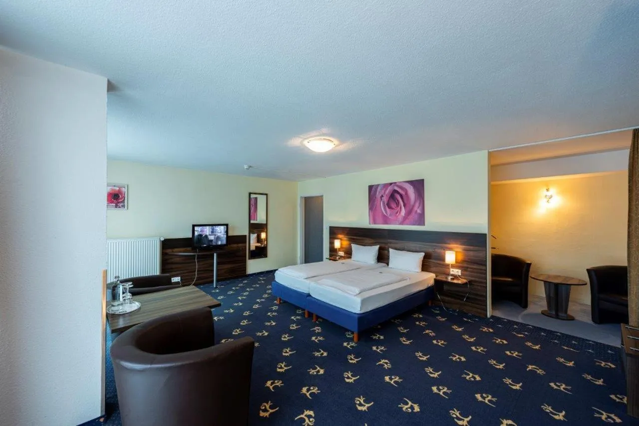 Bed in PANORAMA HOTEL in Neustadt an der Weinstraße