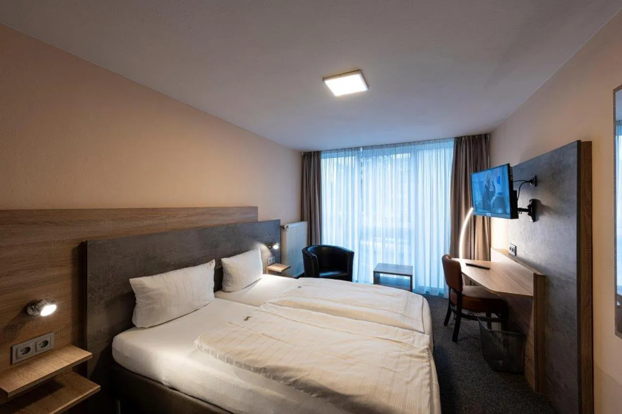 Bed in PANORAMA HOTEL in Neustadt an der Weinstraße