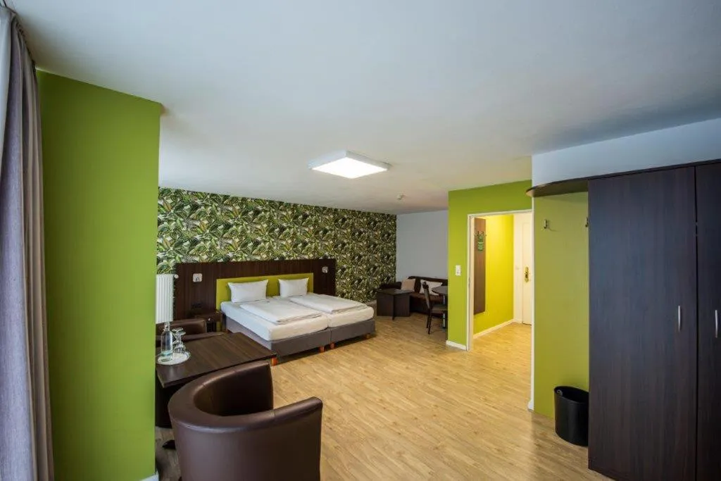 Bed in PANORAMA HOTEL in Neustadt an der Weinstraße