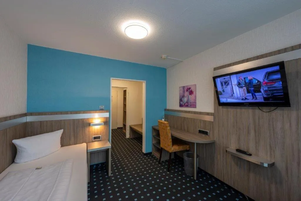 Bed in PANORAMA HOTEL in Neustadt an der Weinstraße