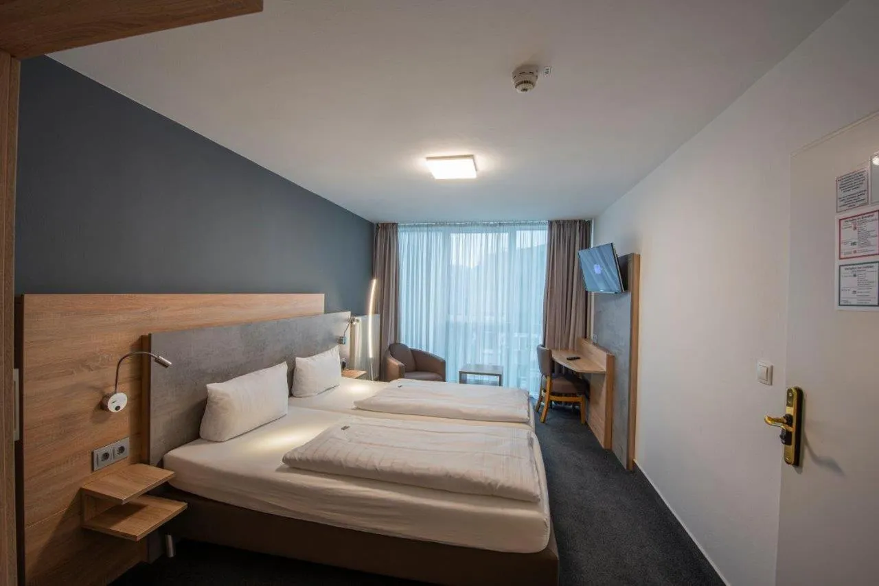 Bed in PANORAMA HOTEL in Neustadt an der Weinstraße