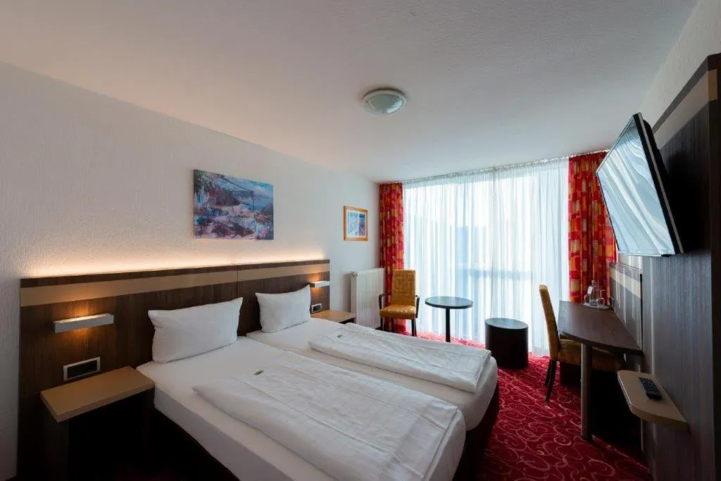 Bed in PANORAMA HOTEL in Neustadt an der Weinstraße