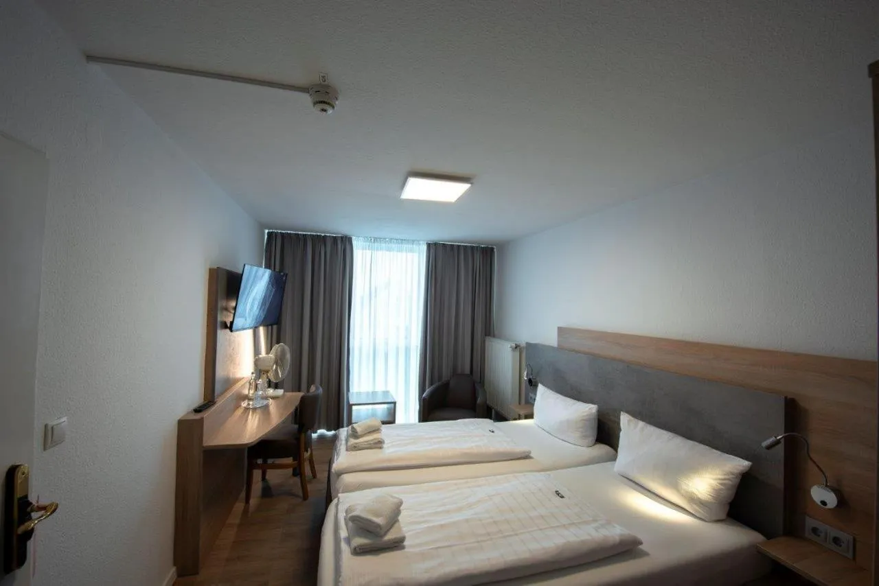 Bed in PANORAMA HOTEL in Neustadt an der Weinstraße