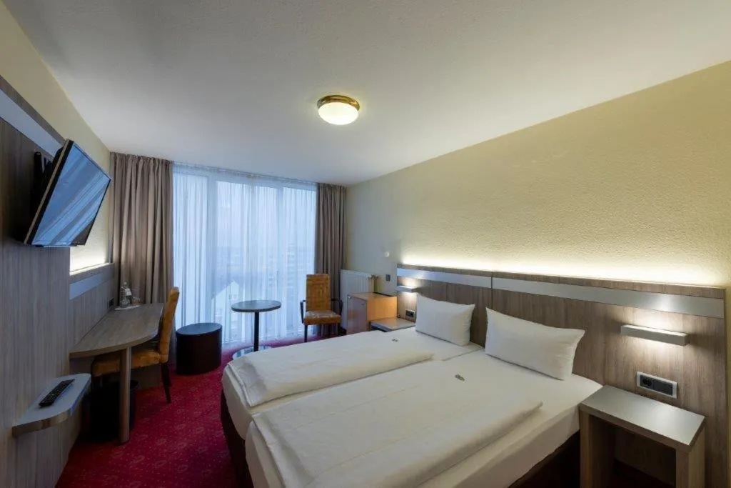 Bed in PANORAMA HOTEL in Neustadt an der Weinstraße