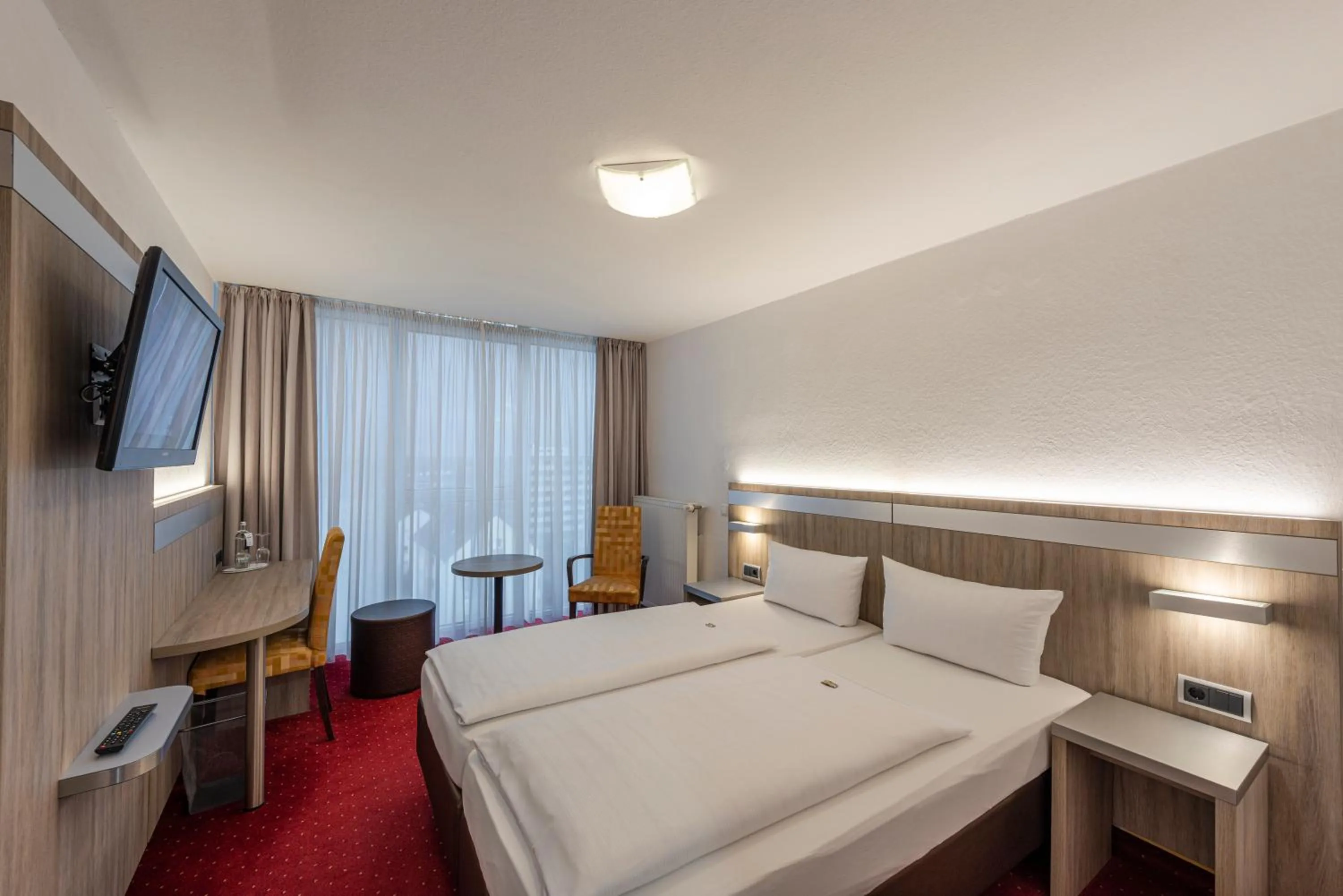 Bed in PANORAMA HOTEL in Neustadt an der Weinstraße