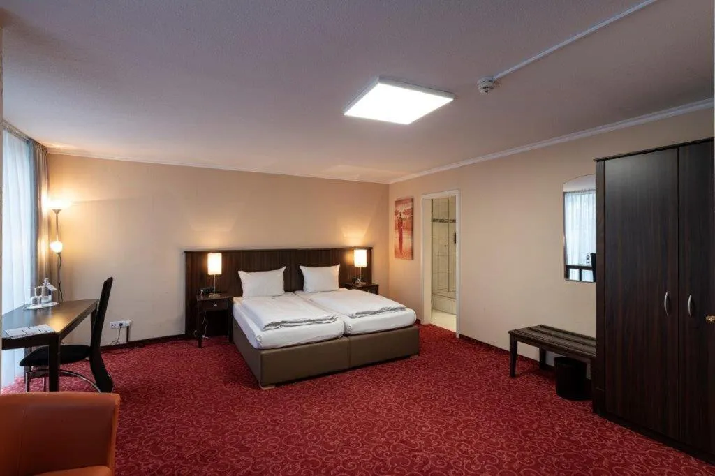 Bed in PANORAMA HOTEL in Neustadt an der Weinstraße