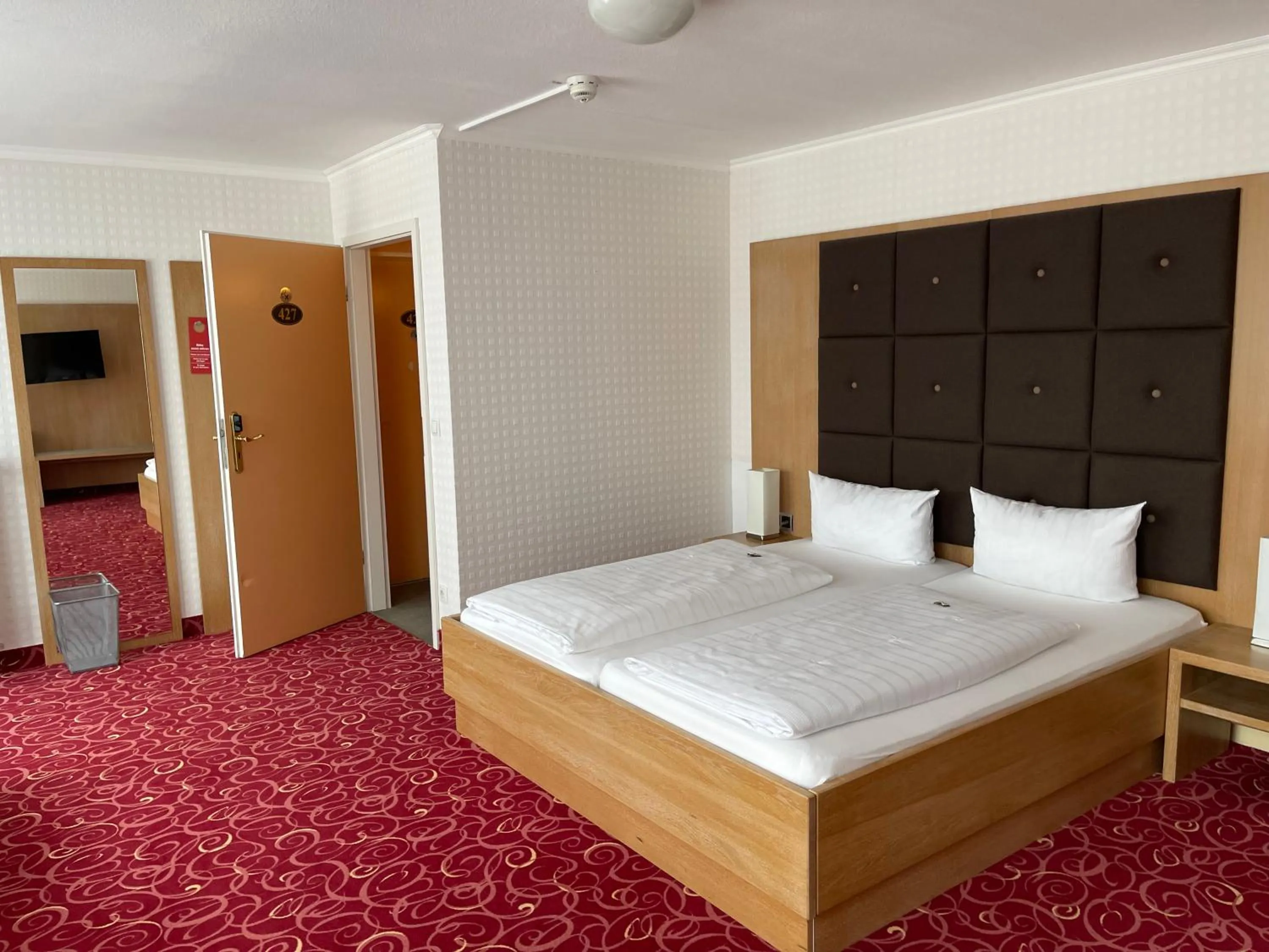 Bed in PANORAMA HOTEL in Neustadt an der Weinstraße