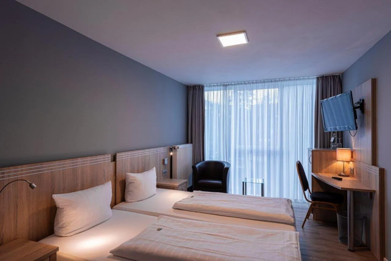 Bed in PANORAMA HOTEL in Neustadt an der Weinstraße