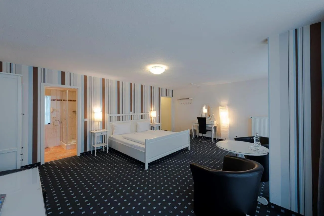 Bed in PANORAMA HOTEL in Neustadt an der Weinstraße