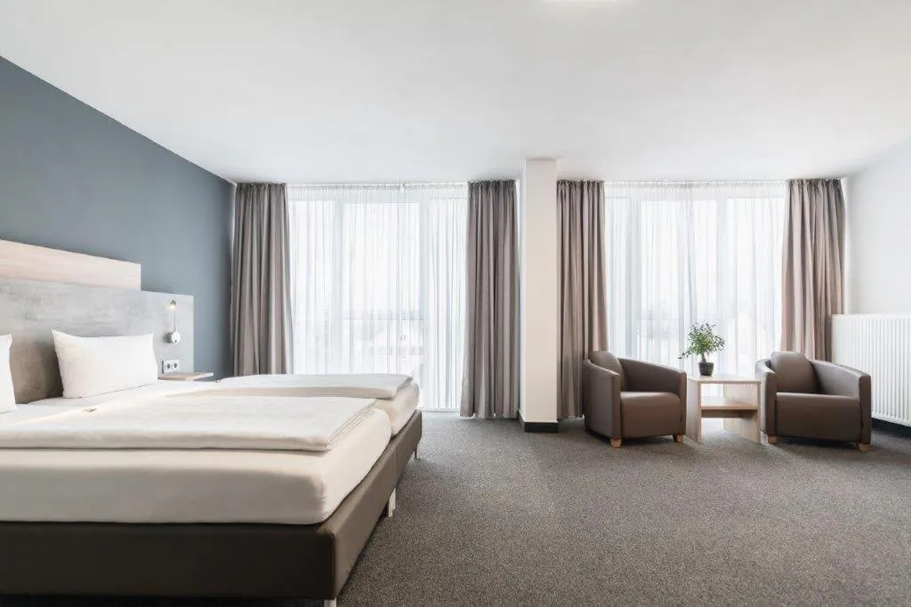 Bed in PANORAMA HOTEL in Neustadt an der Weinstraße