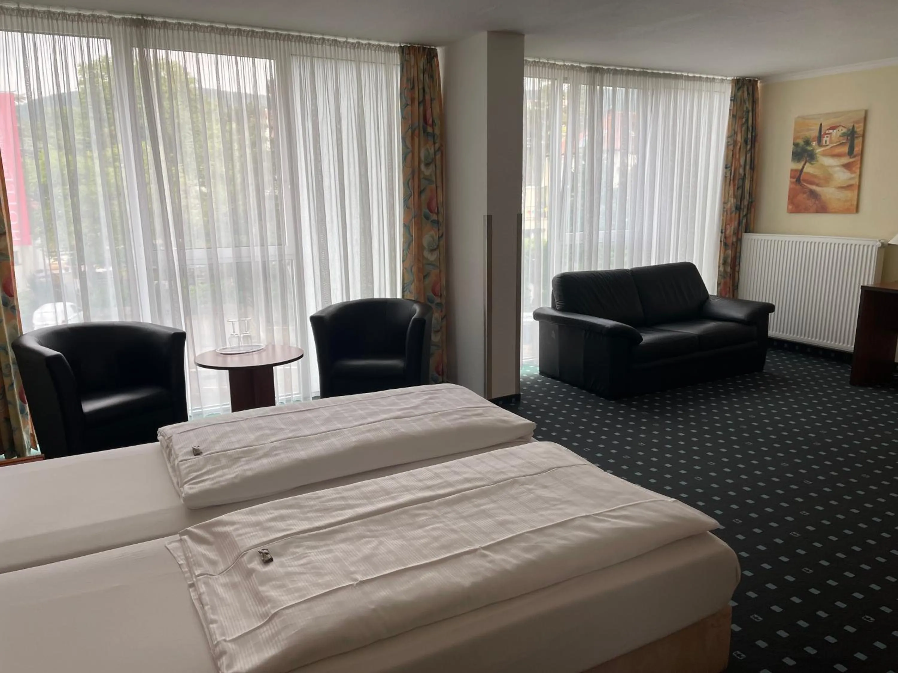 Bed in PANORAMA HOTEL in Neustadt an der Weinstraße