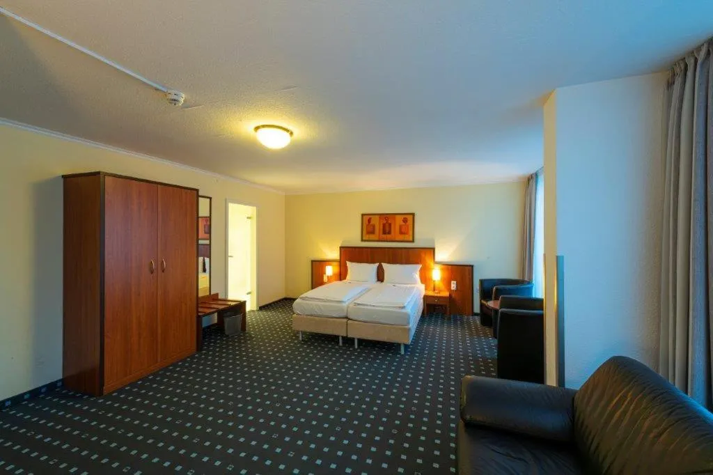 Bed in PANORAMA HOTEL in Neustadt an der Weinstraße