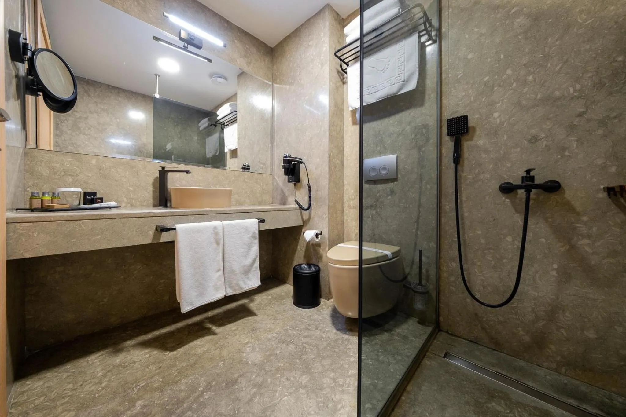 Shower in Avec Hotel