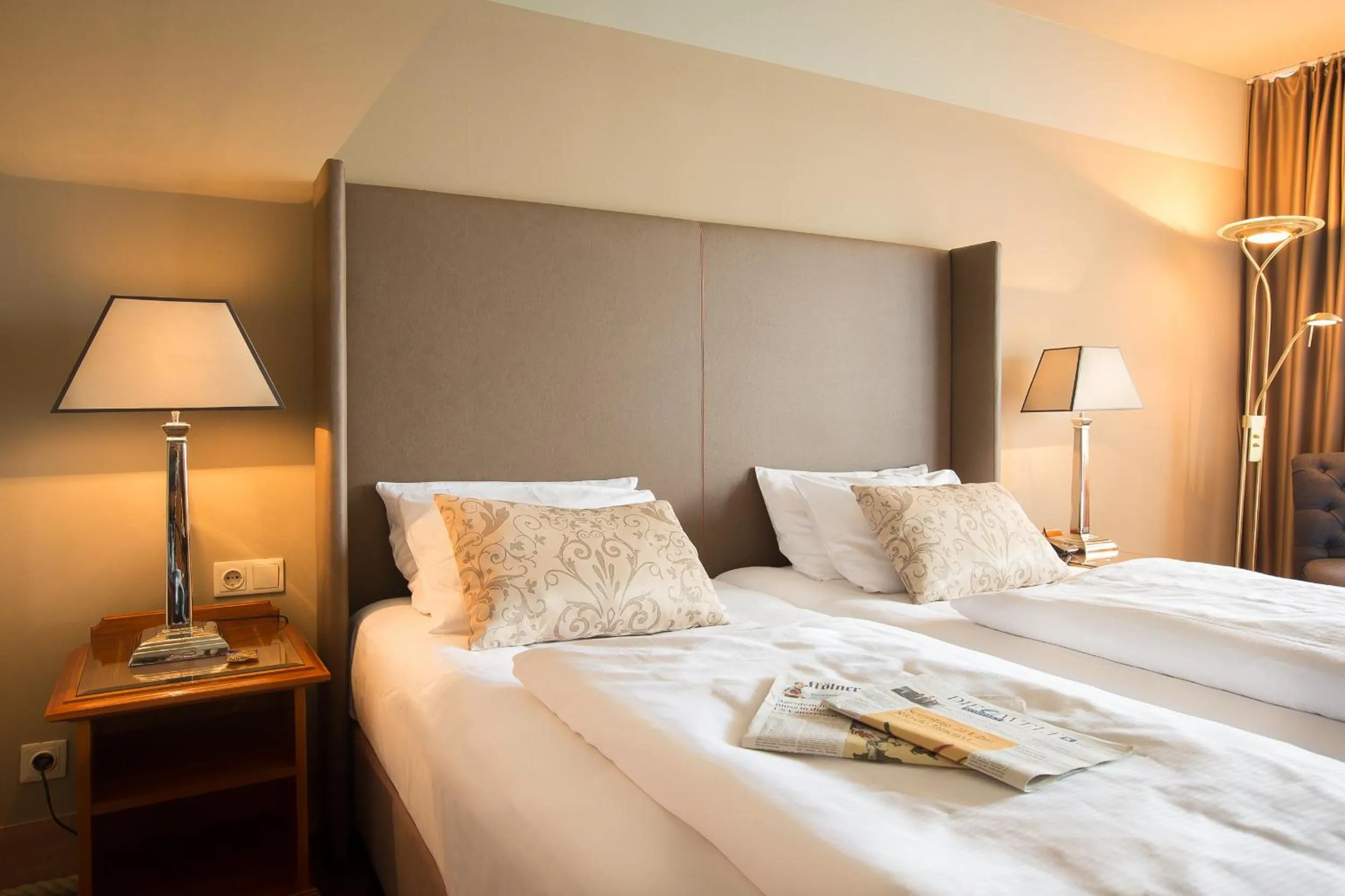 Bed in The Ascot Hotel