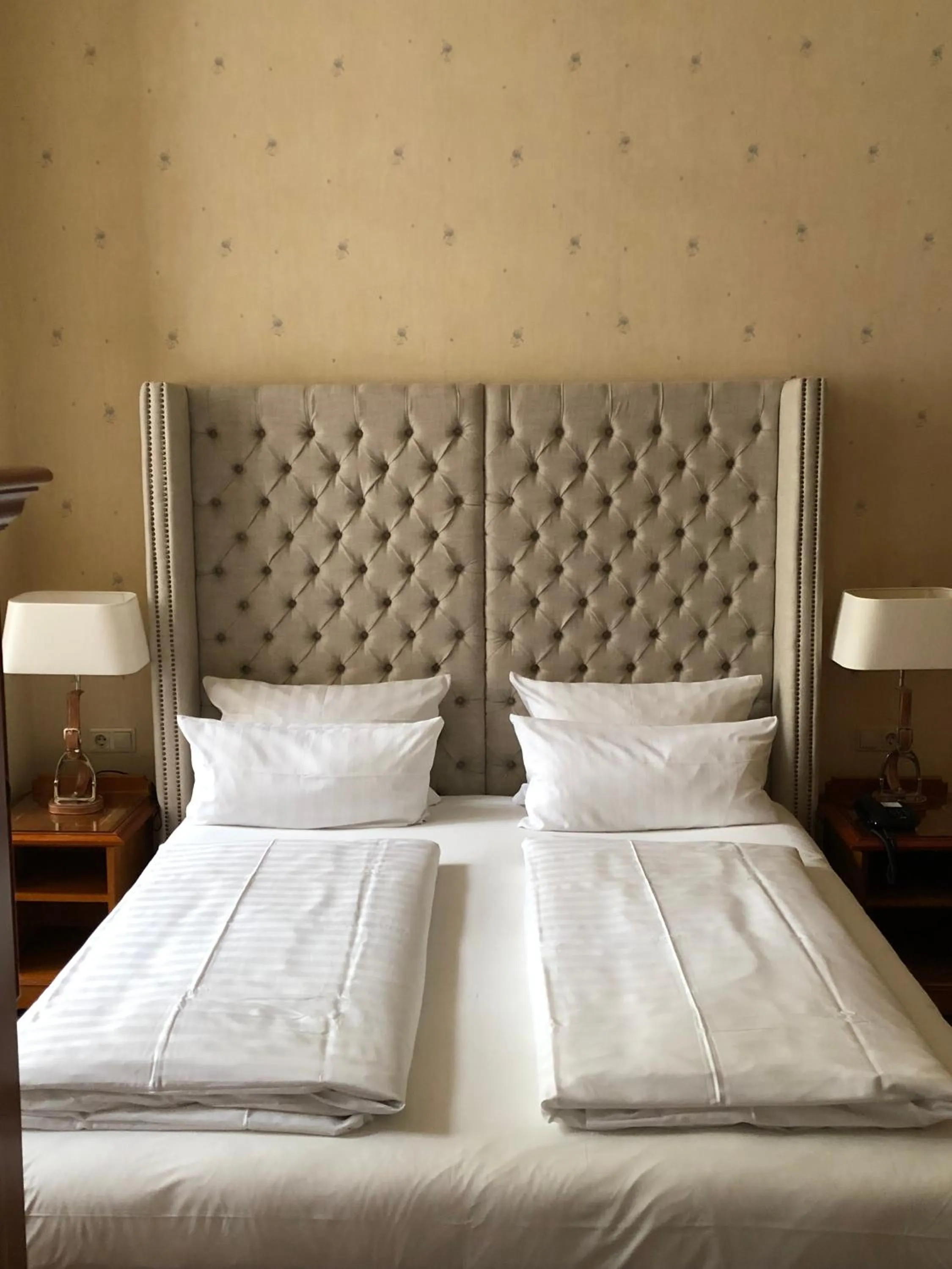 Bed in The Ascot Hotel