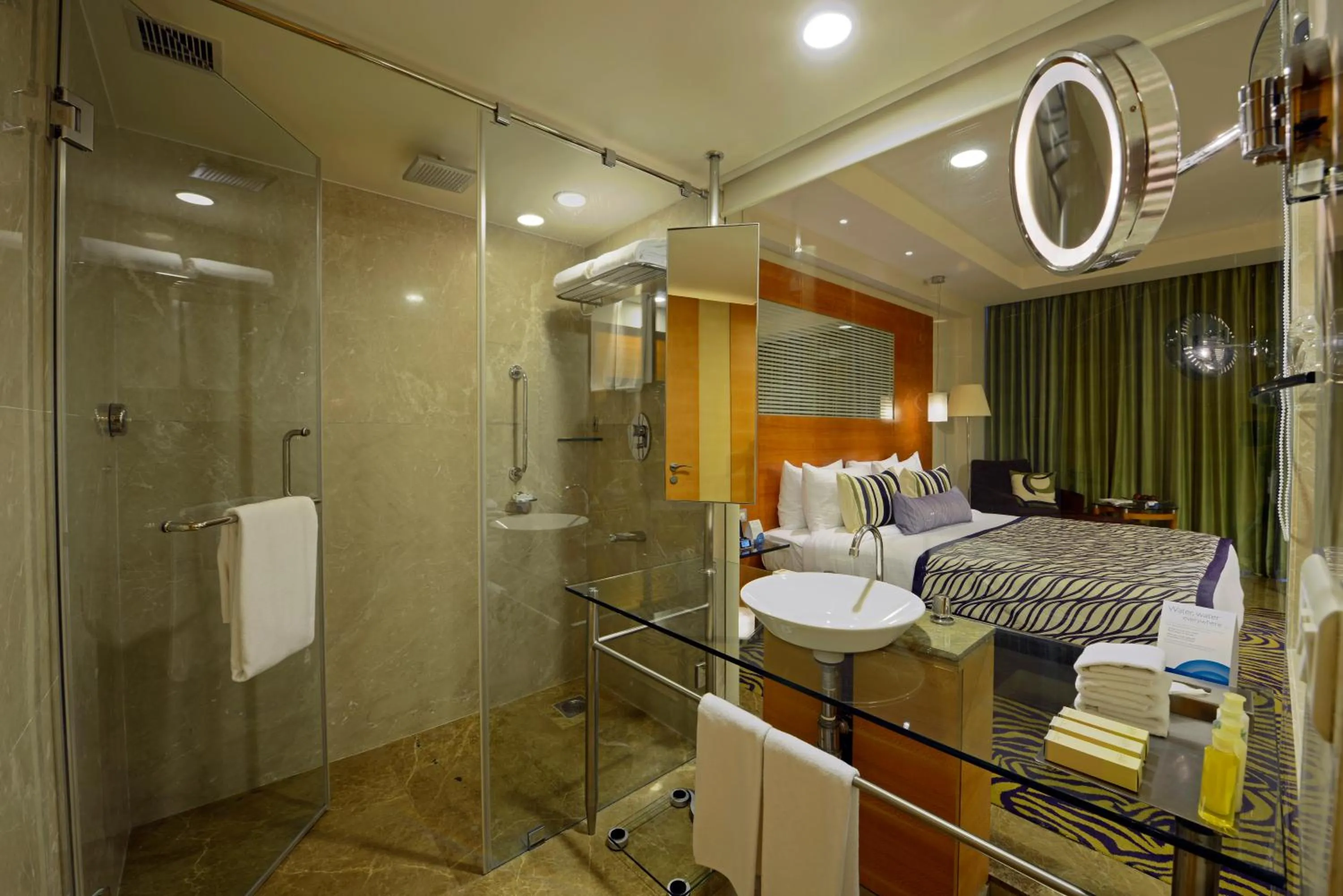 Bathroom, Bed in Radisson Blu Hotel Ahmedabad