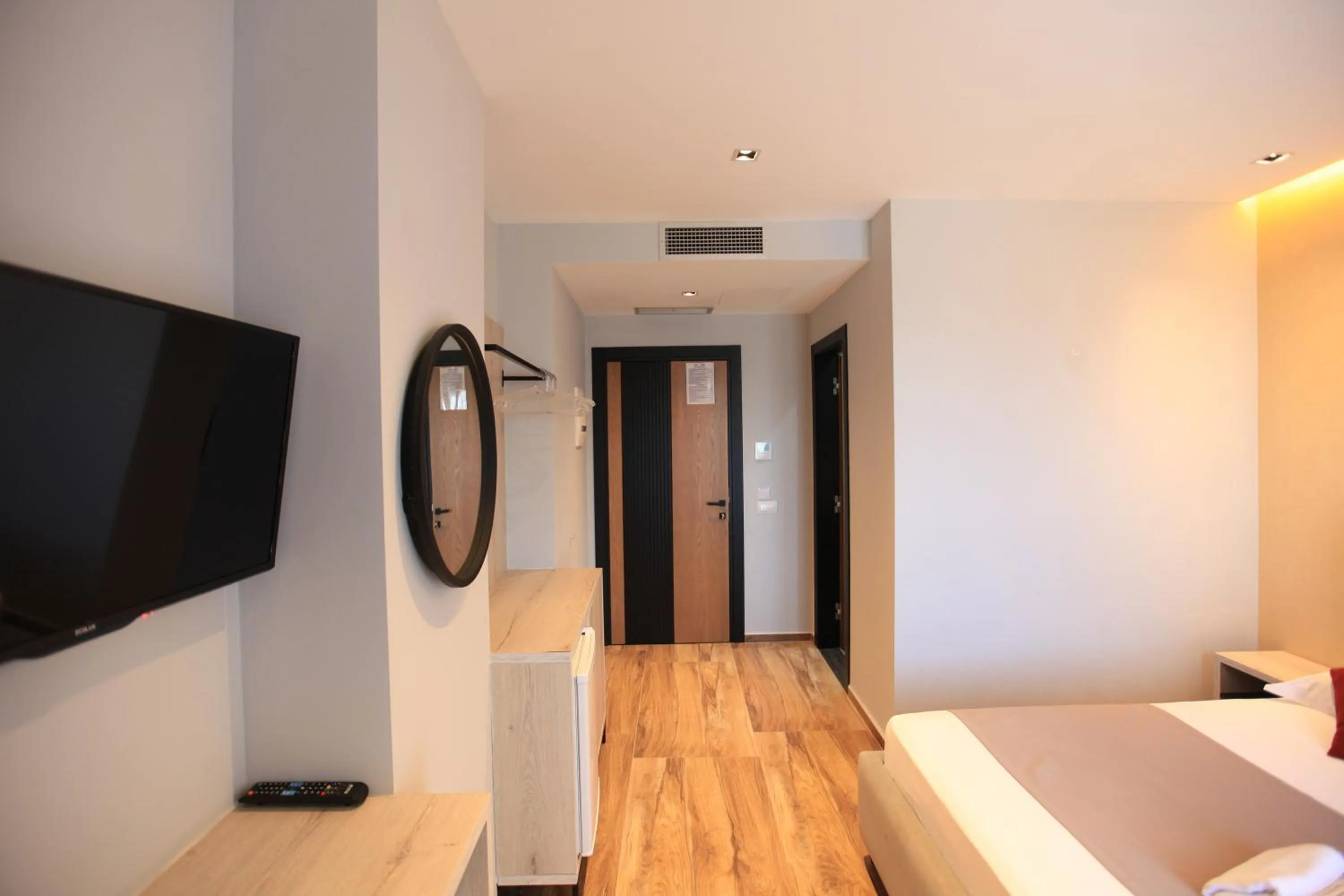 Seating area, Bed in Hotel Citrus