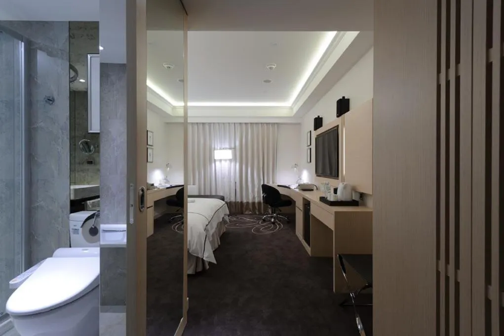 Bed in K Hotel Taipei Songjiang