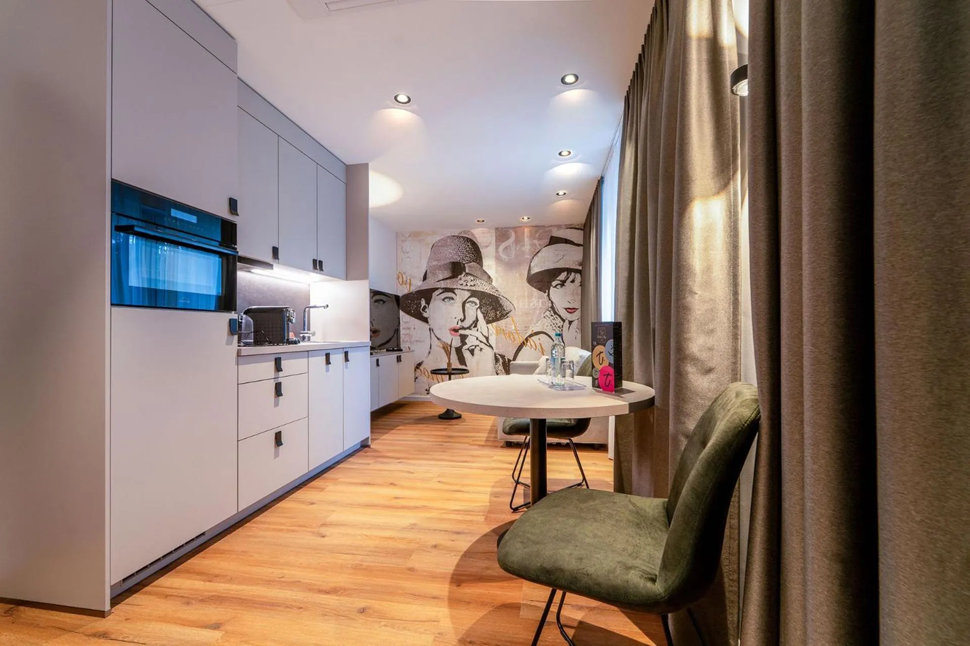 Kitchen or kitchenette in Hotel Am Triller - Hotel & Serviced Apartments