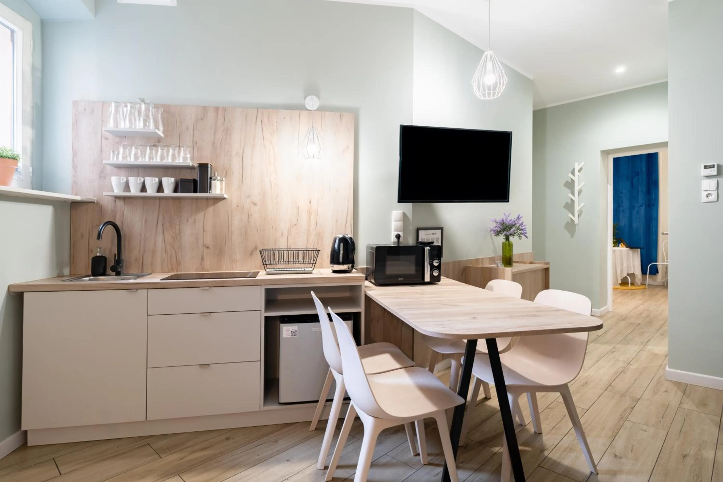 Kitchen or kitchenette in Łazienna Premier by Rentoom