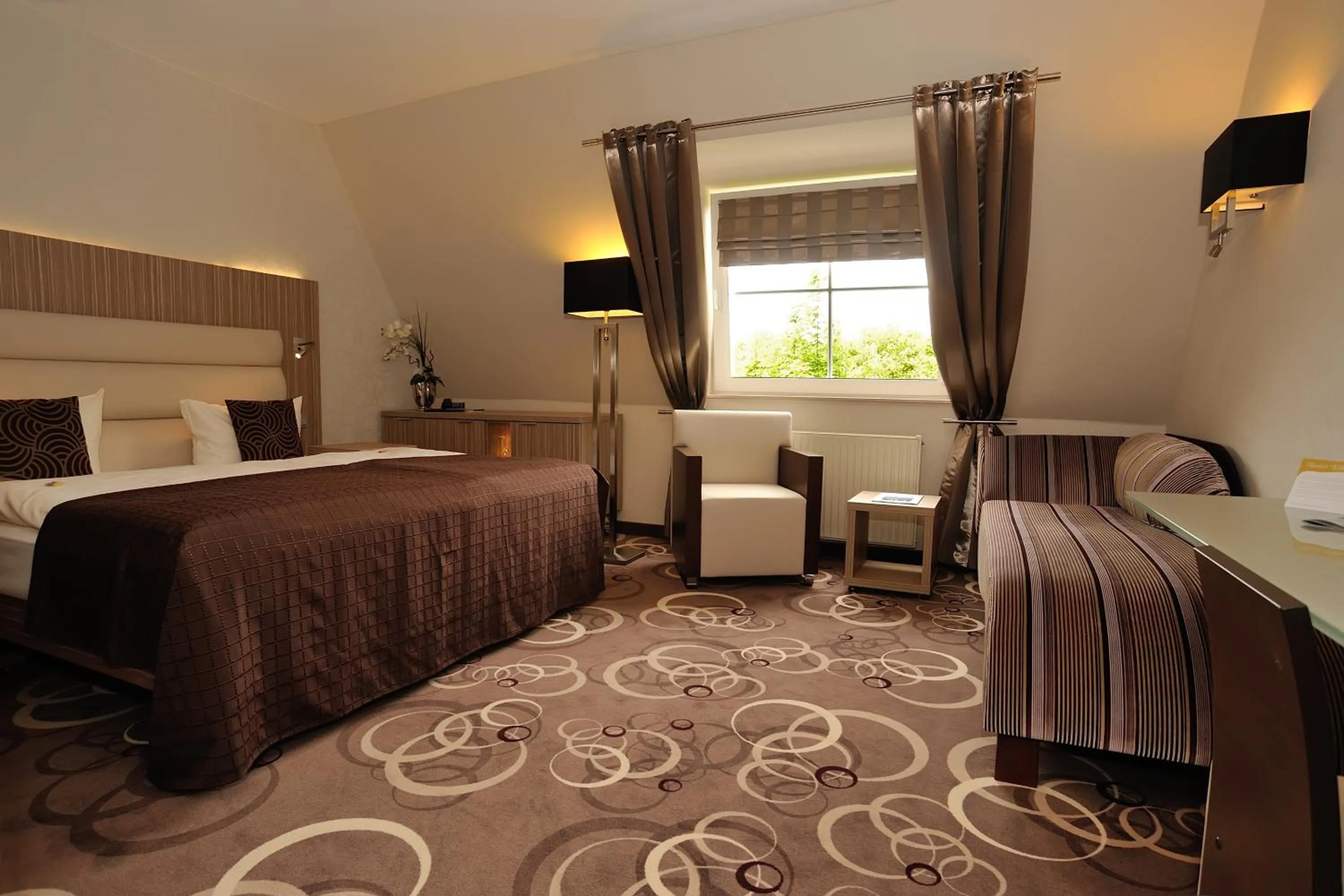 Photo of the whole room, Bed in NordWest-Hotel Bad Zwischenahn