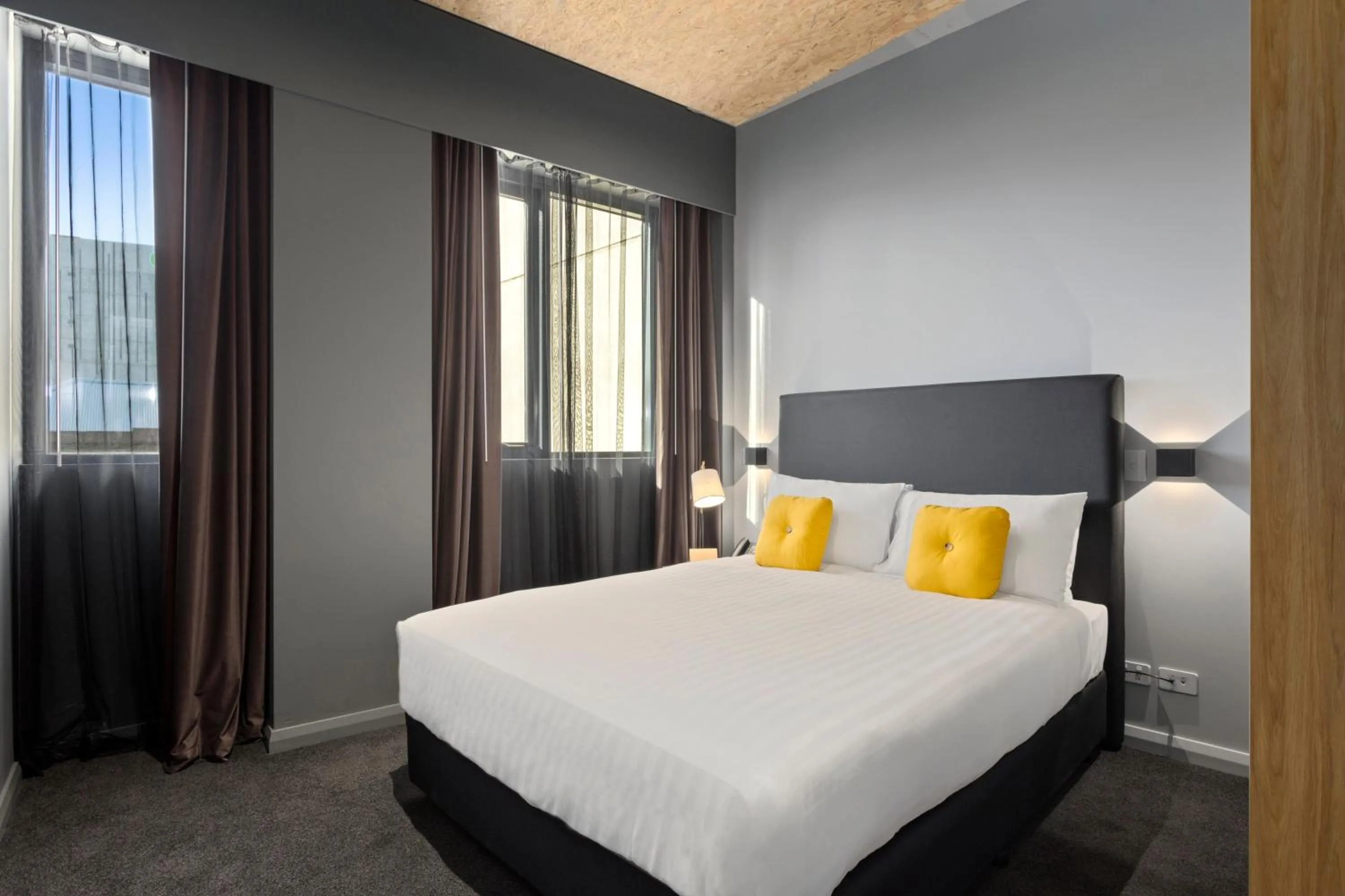 Bed in Hobart City Apartments