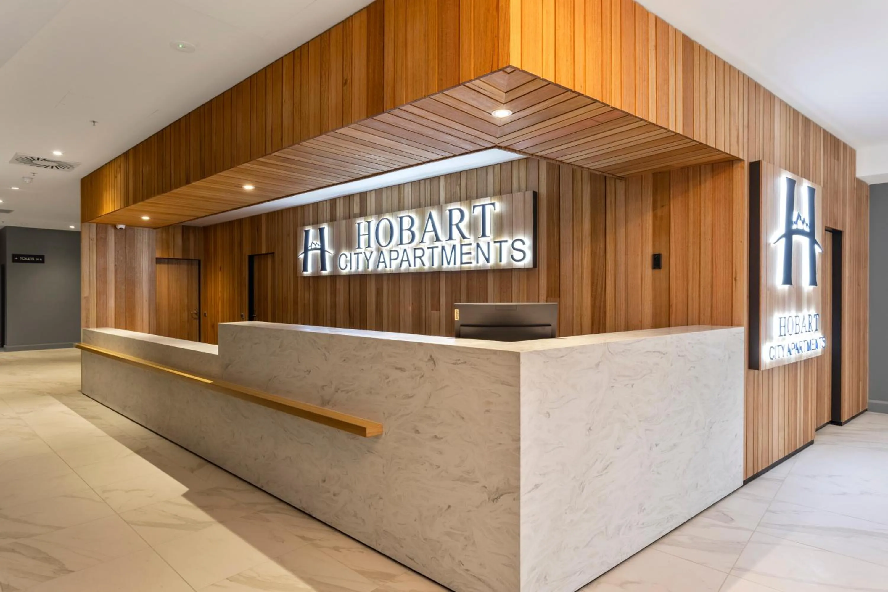 Property logo or sign in Hobart City Apartments