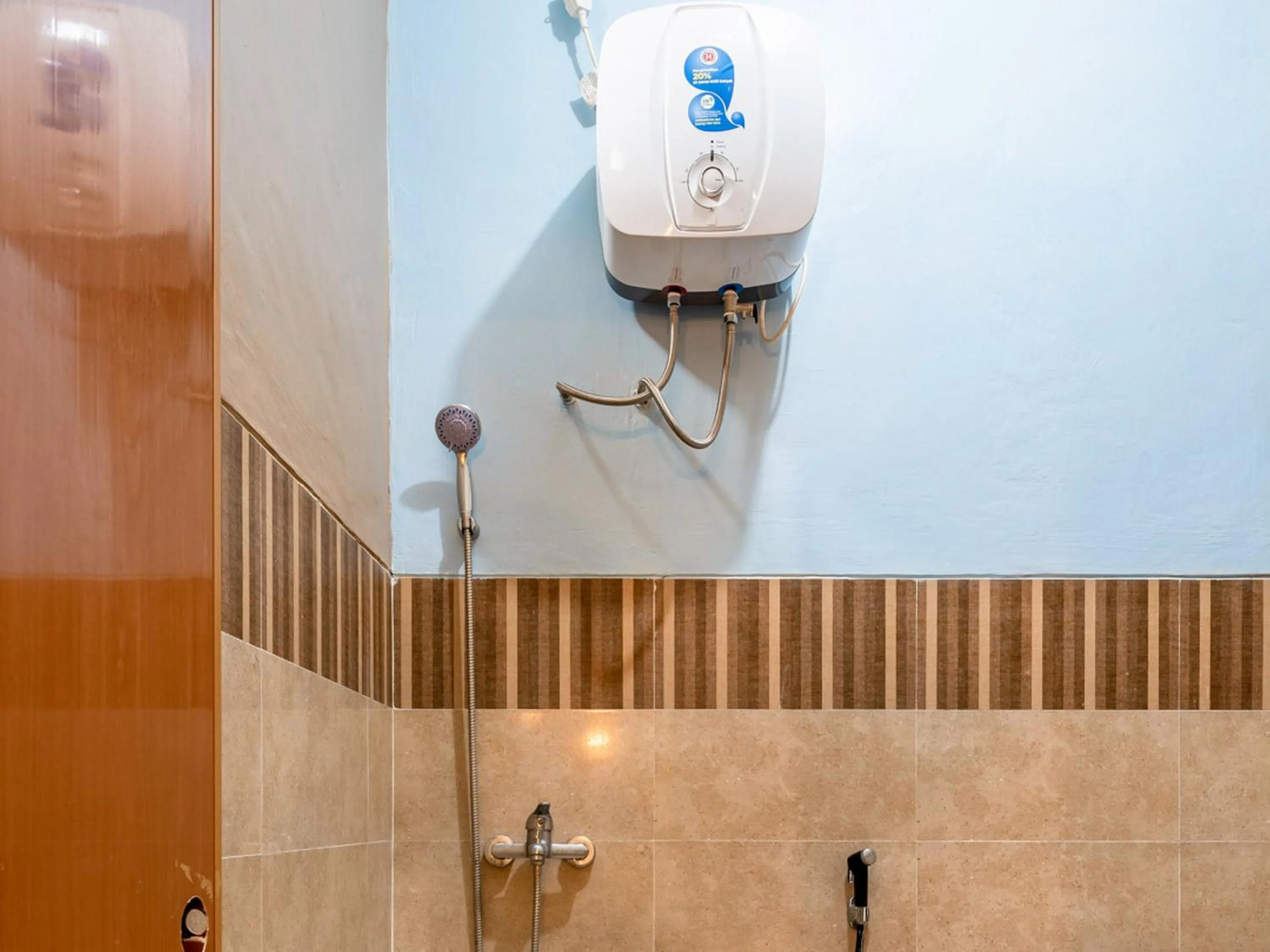 Bathroom in RedDoorz near Dino Park