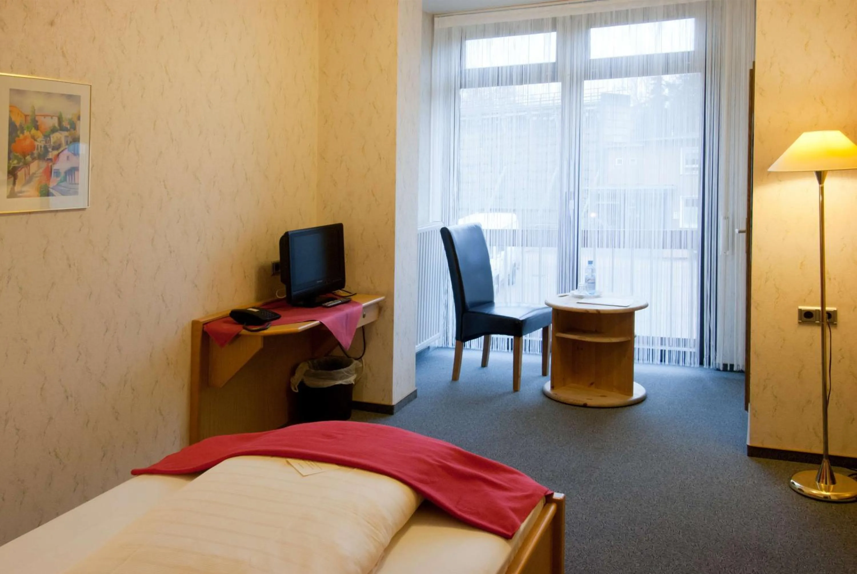 Seating area, Bed in Hotel Garni am Goetheplatz