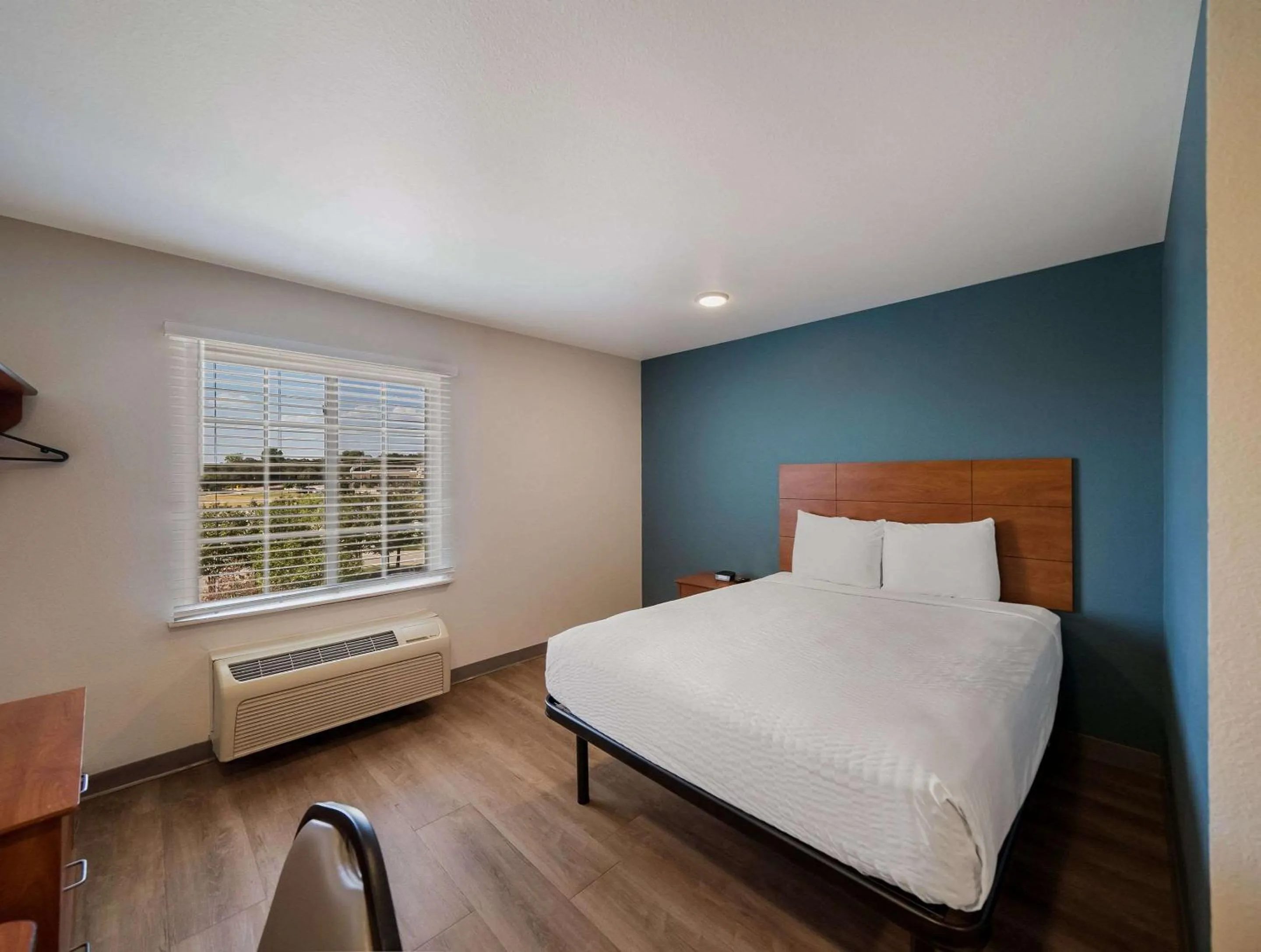 Bedroom, Bed in WoodSpring Suites Fort Worth Trophy Club