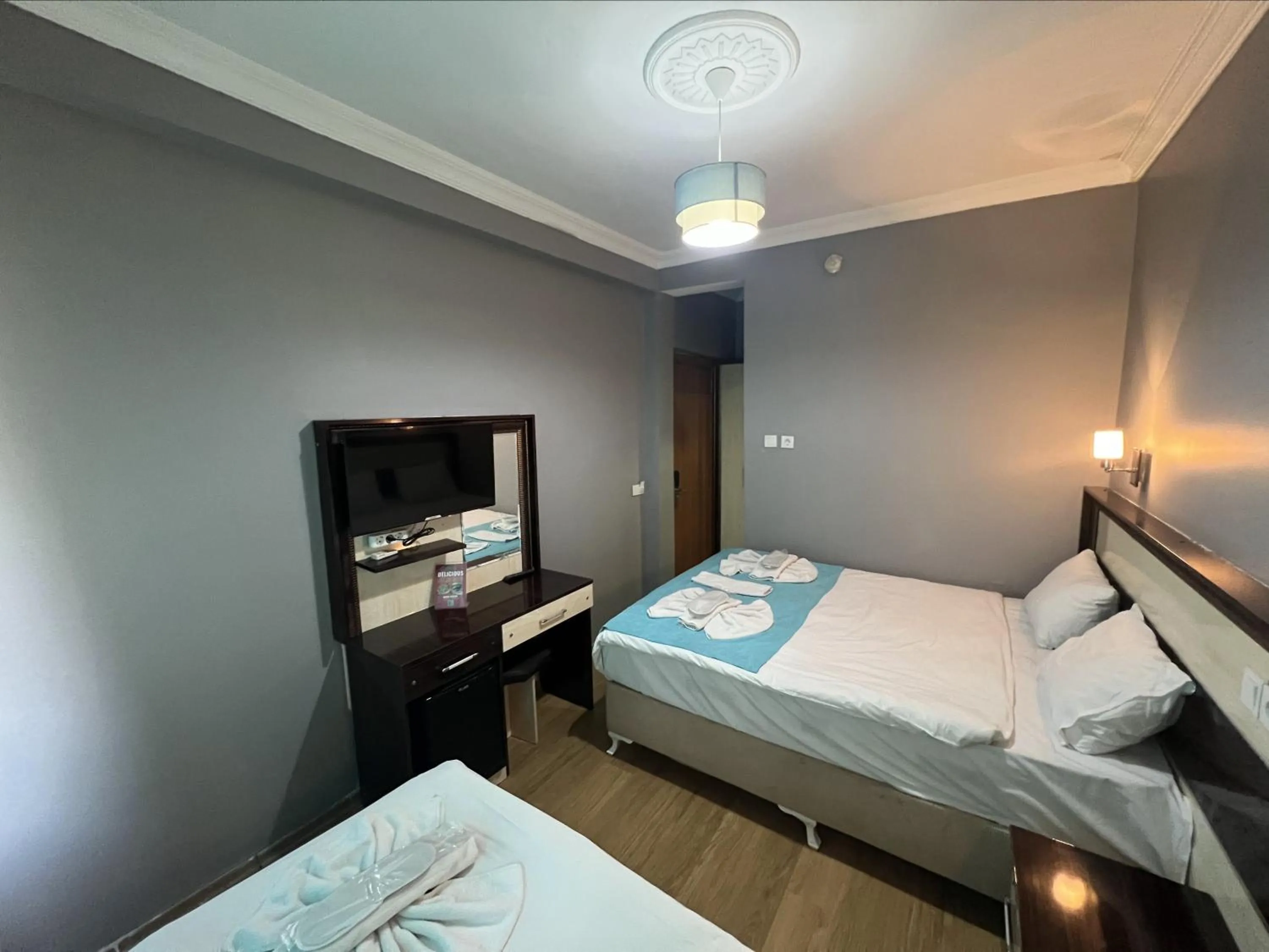 Communal lounge/ TV room, Bed in Old City Park Hotel