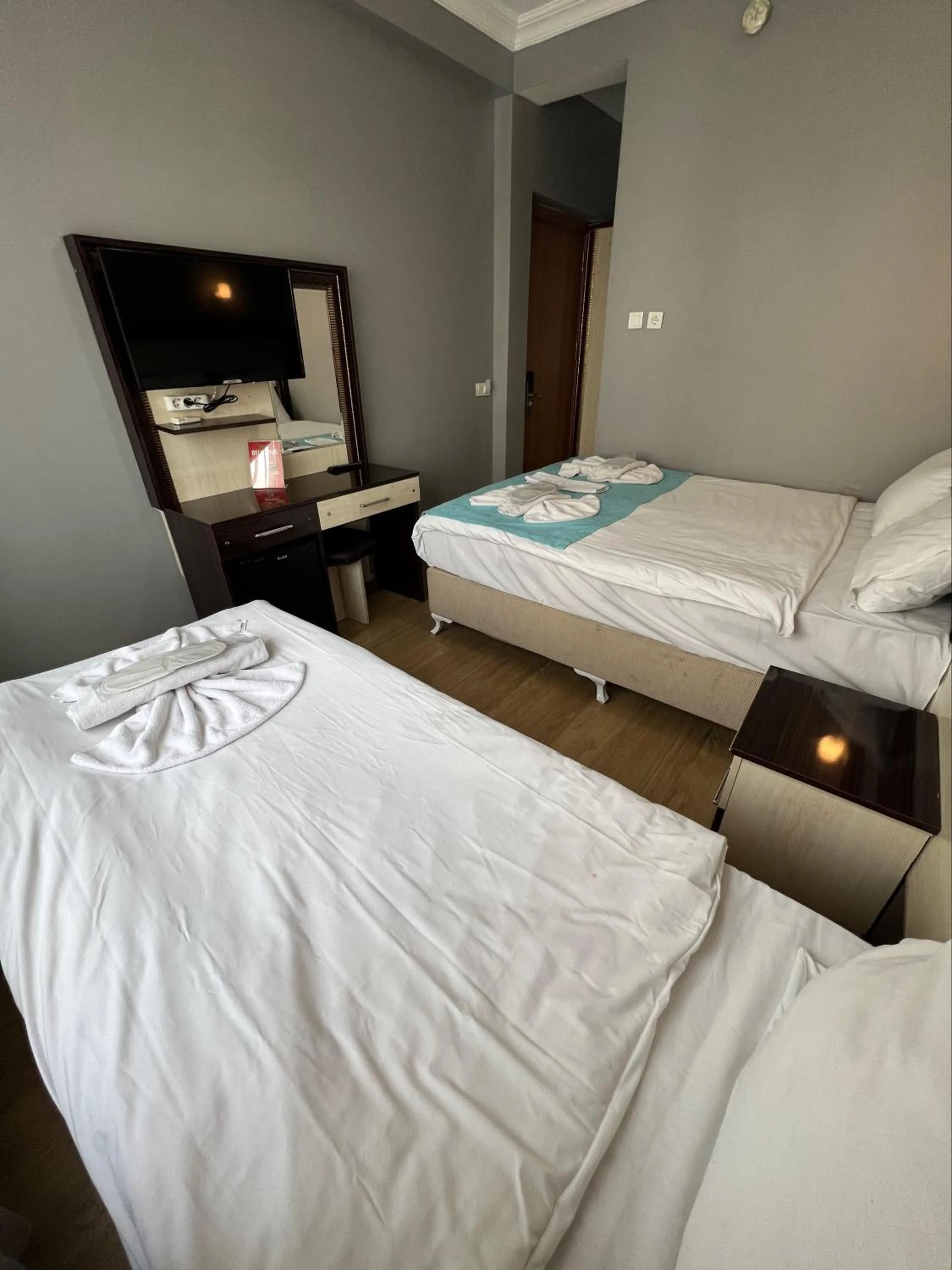 Communal lounge/ TV room, Bed in Old City Park Hotel