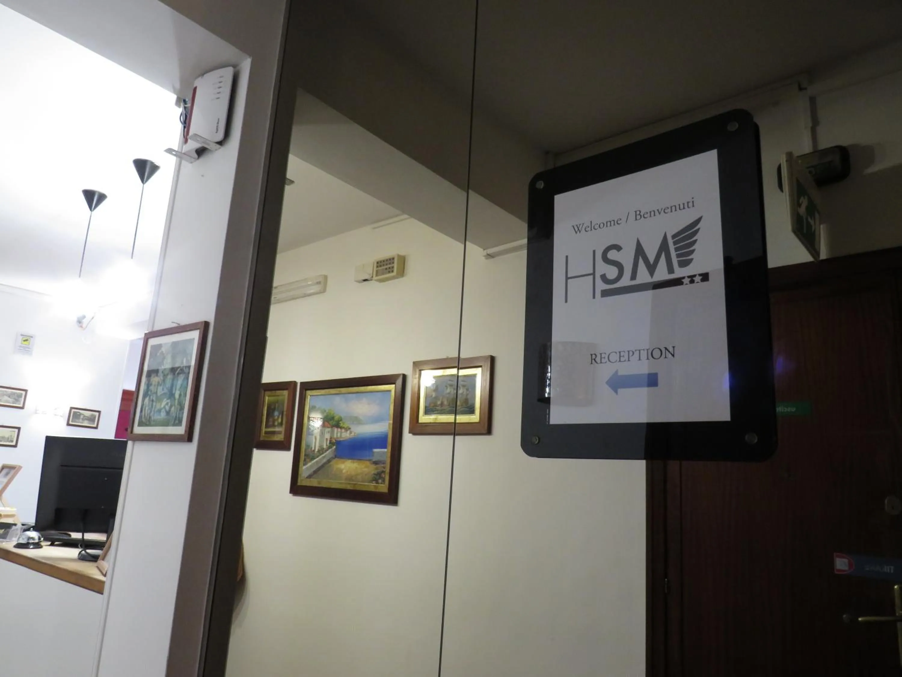 Property logo or sign in Hotel San Michele