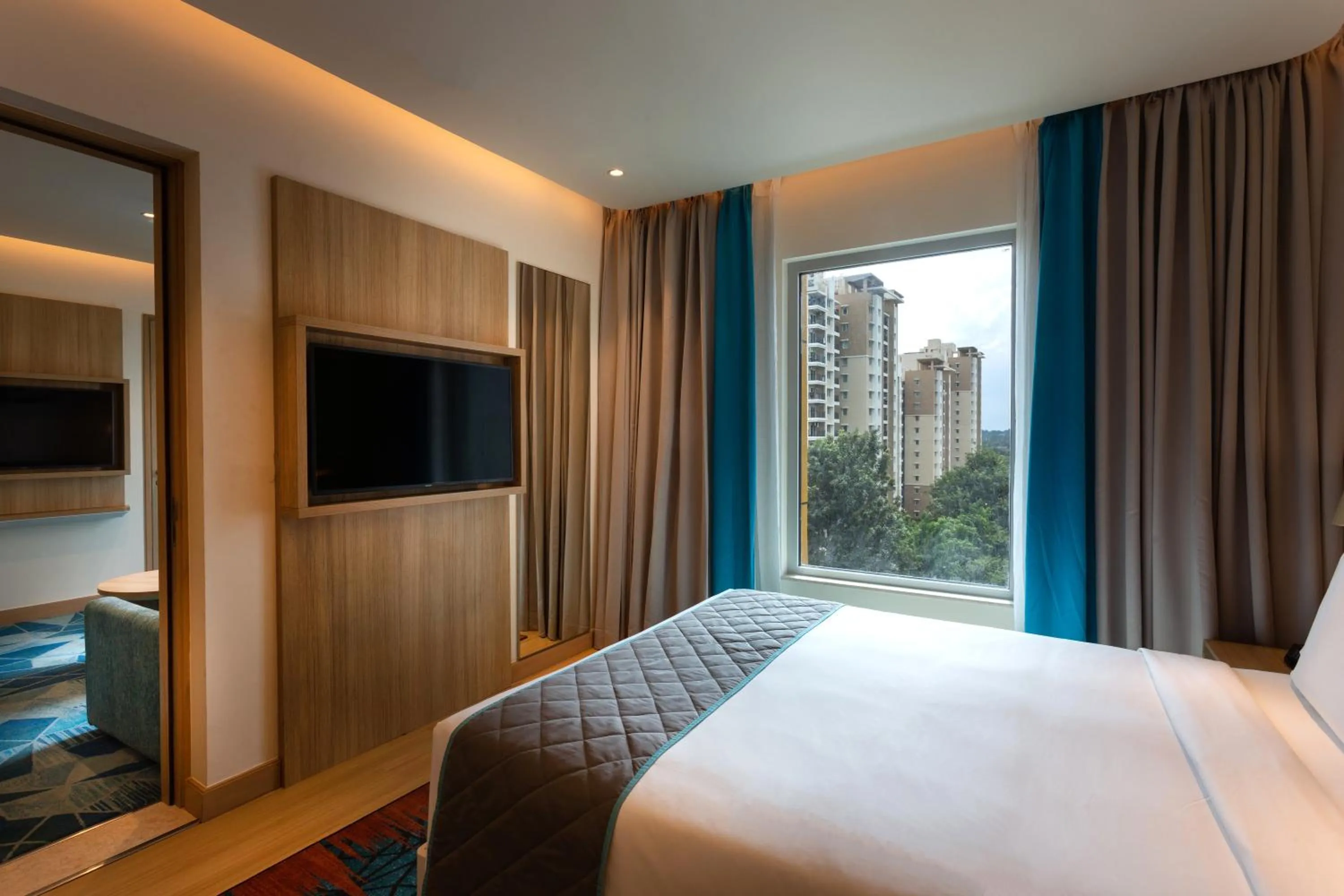 TV and multimedia, Bed in Holiday Inn Express & Suites Bengaluru Old Madras Road by IHG