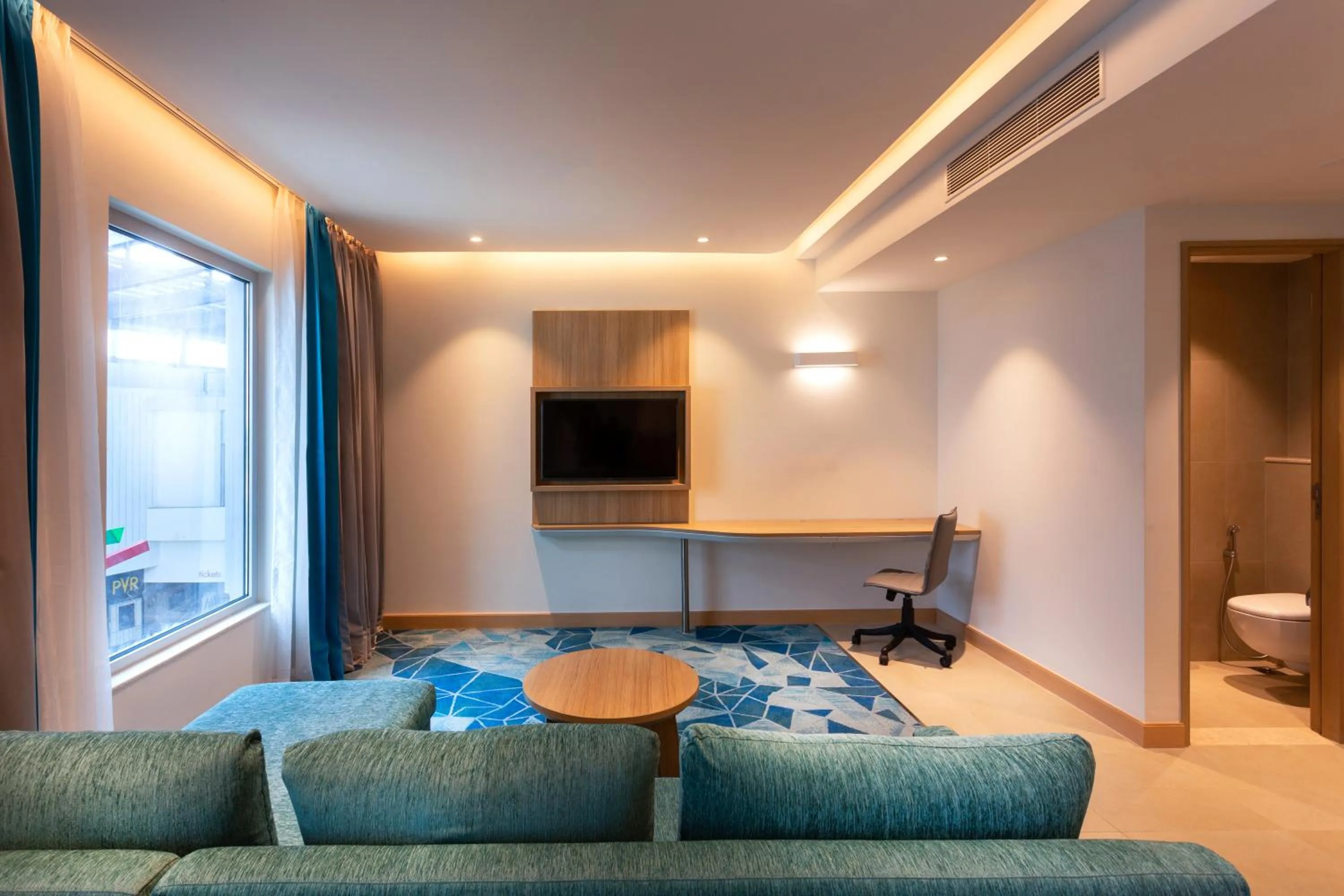 Bathroom in Holiday Inn Express & Suites Bengaluru Old Madras Road by IHG