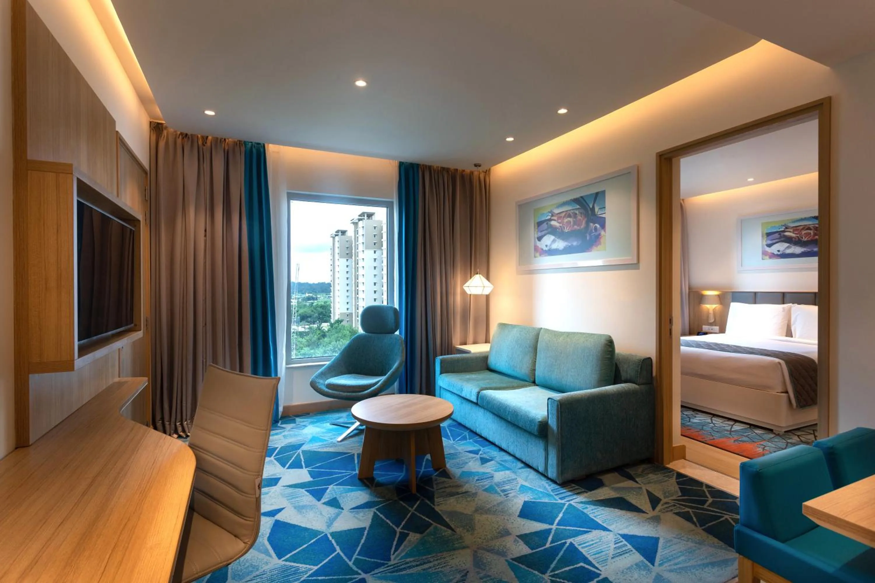 Living room, Bed in Holiday Inn Express & Suites Bengaluru Old Madras Road by IHG