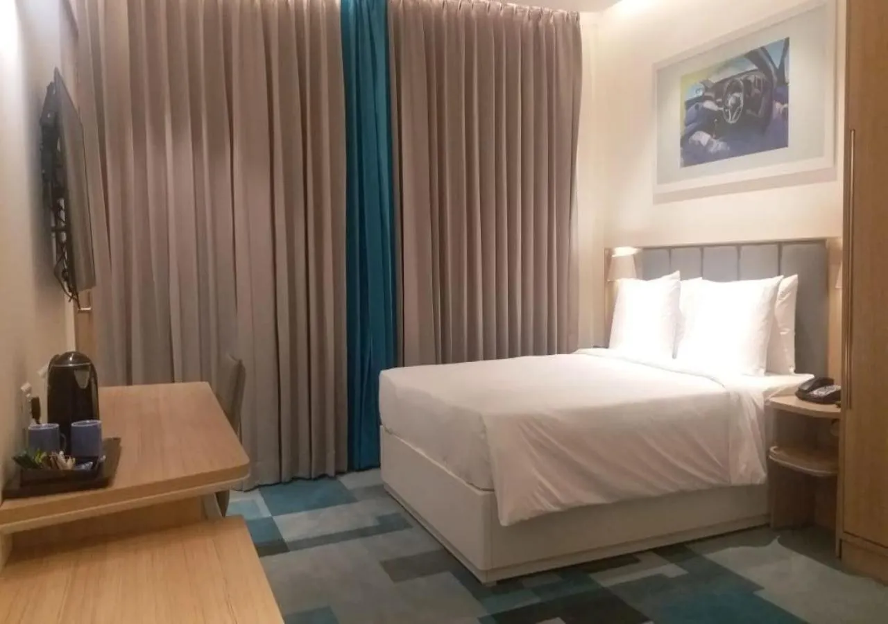 Seating area, Bed in Holiday Inn Express & Suites Bengaluru Old Madras Road by IHG