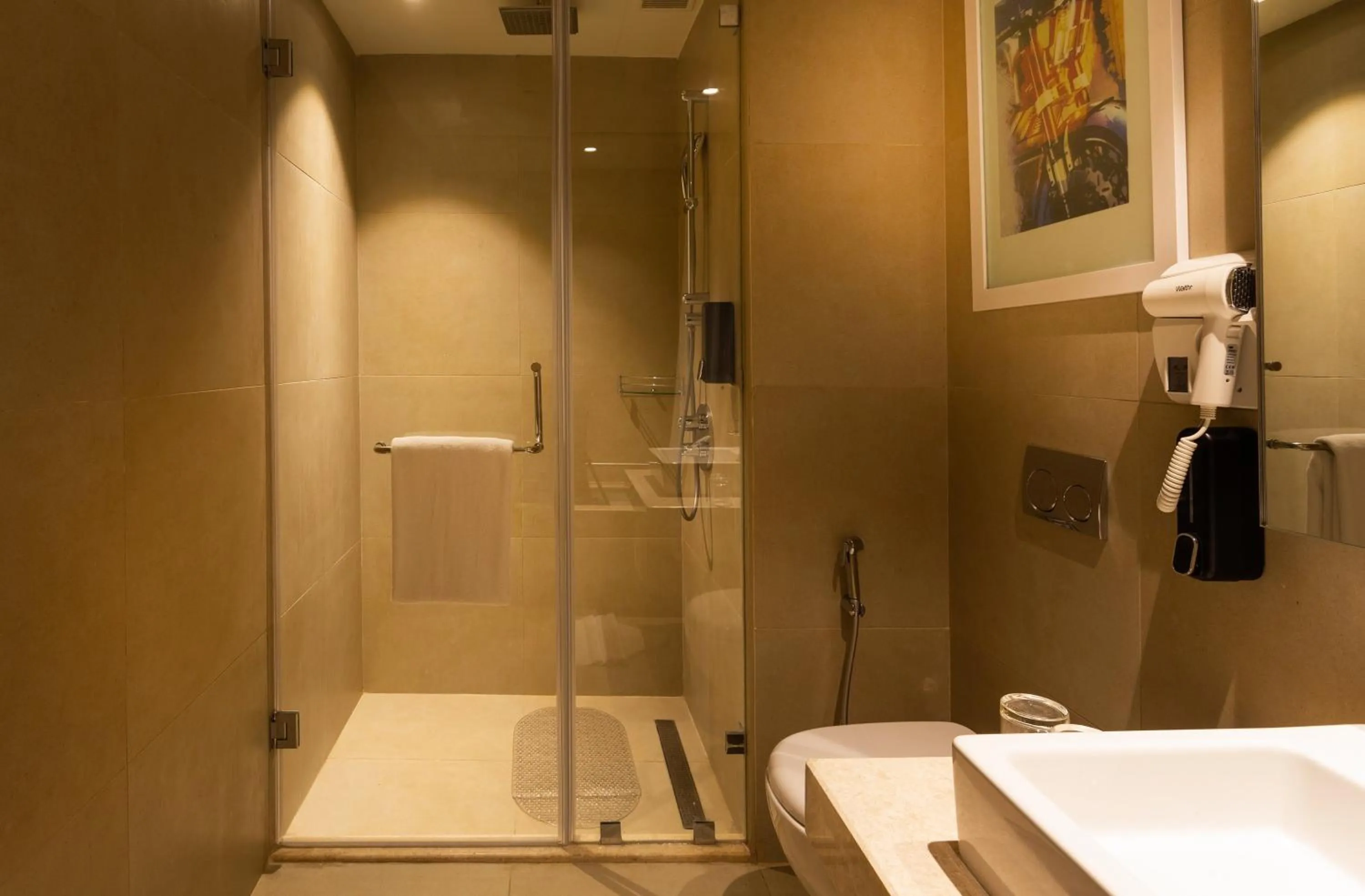 Bathroom in Holiday Inn Express & Suites Bengaluru Old Madras Road by IHG