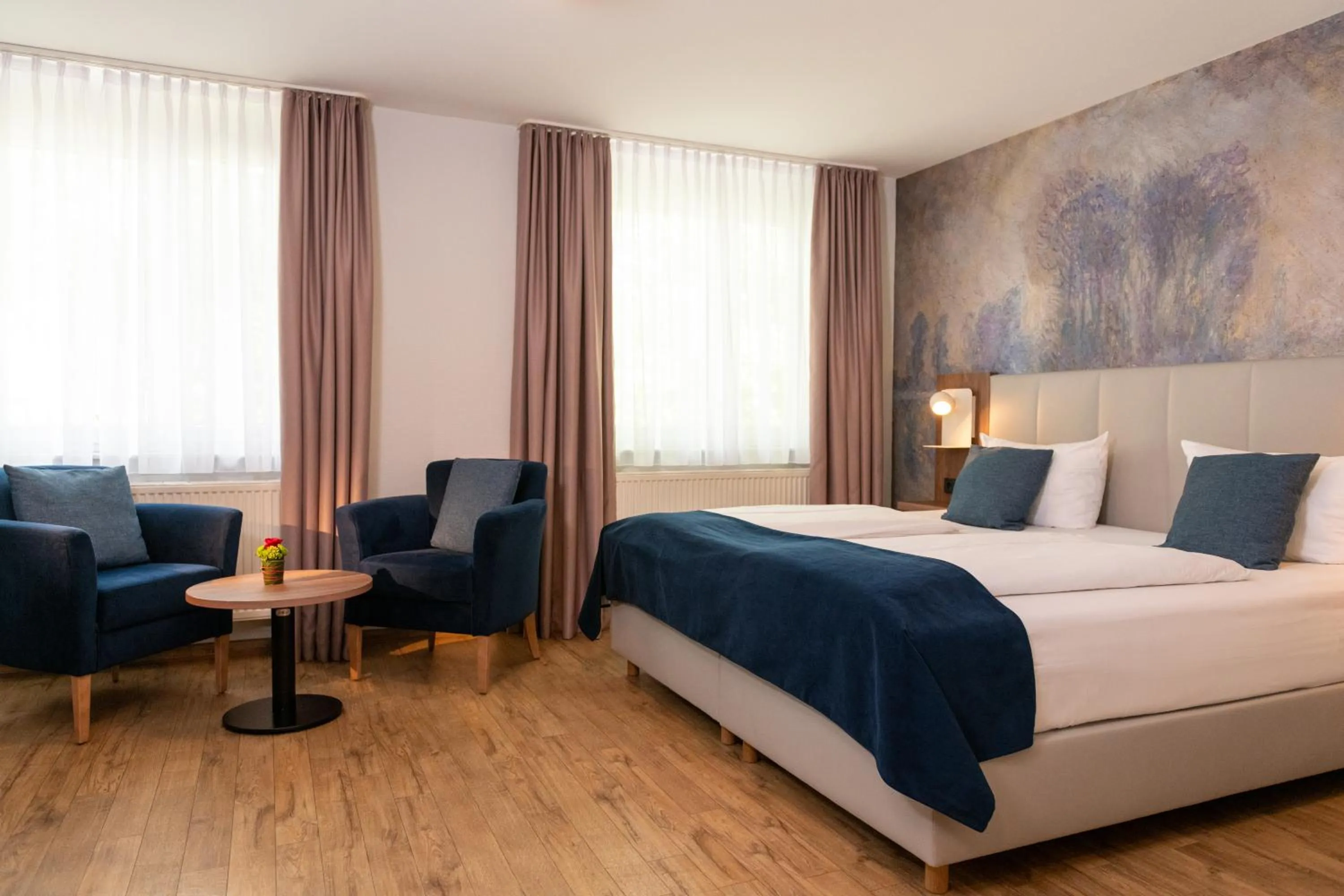 Seating area, Bed in Art Hotel Aachen