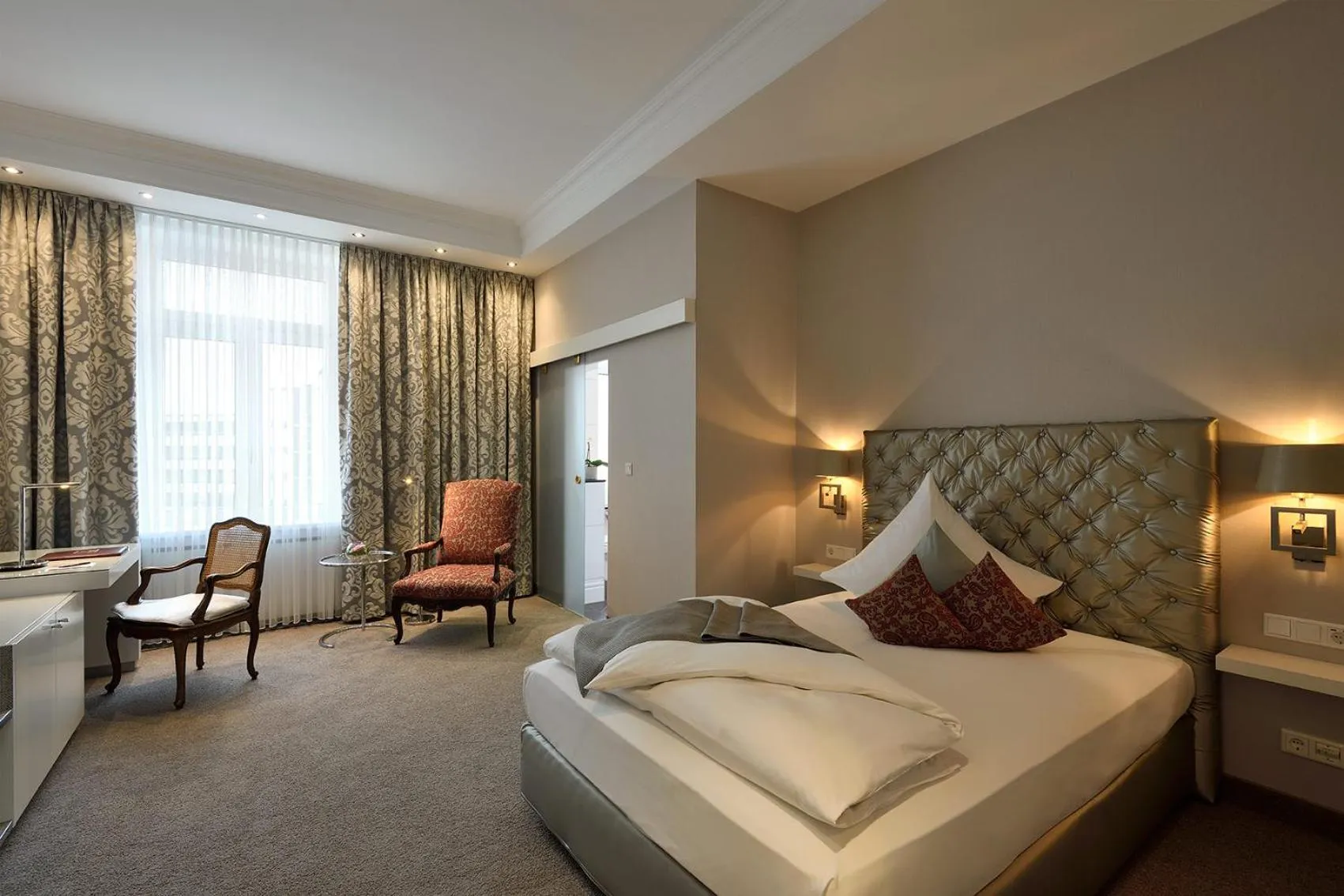 Photo of the whole room, Bed in Kastens Hotel Luisenhof