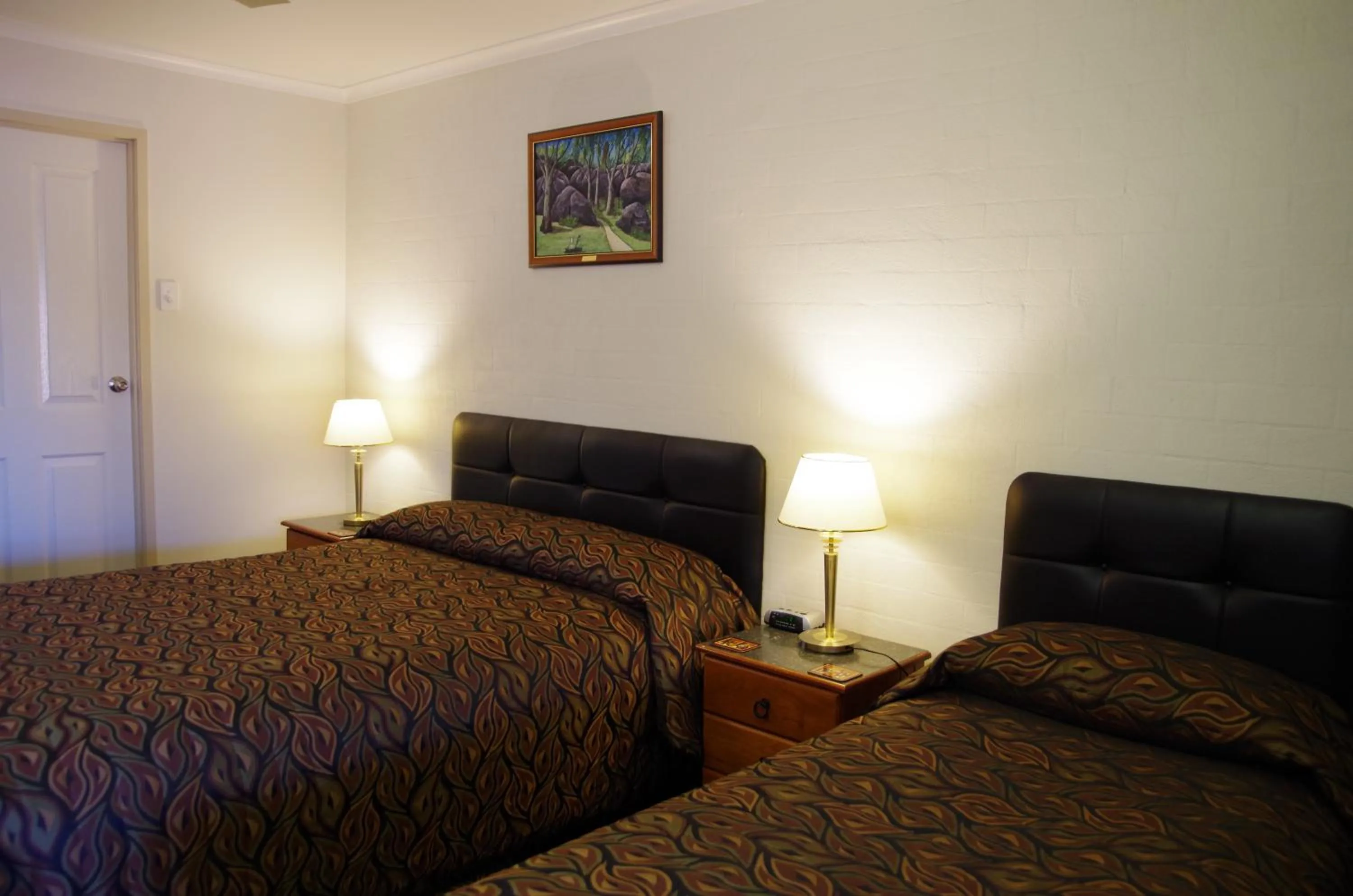 Decorative detail, Bed in Stannum Lodge Motor Inn