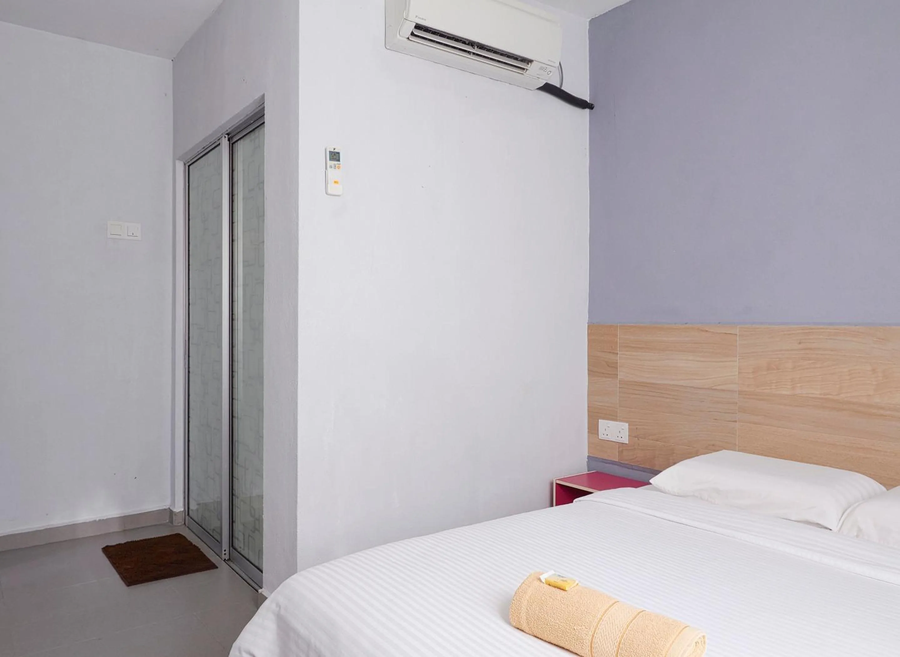 Bed in Corrie Chalet Pantai Cenang Langkawi