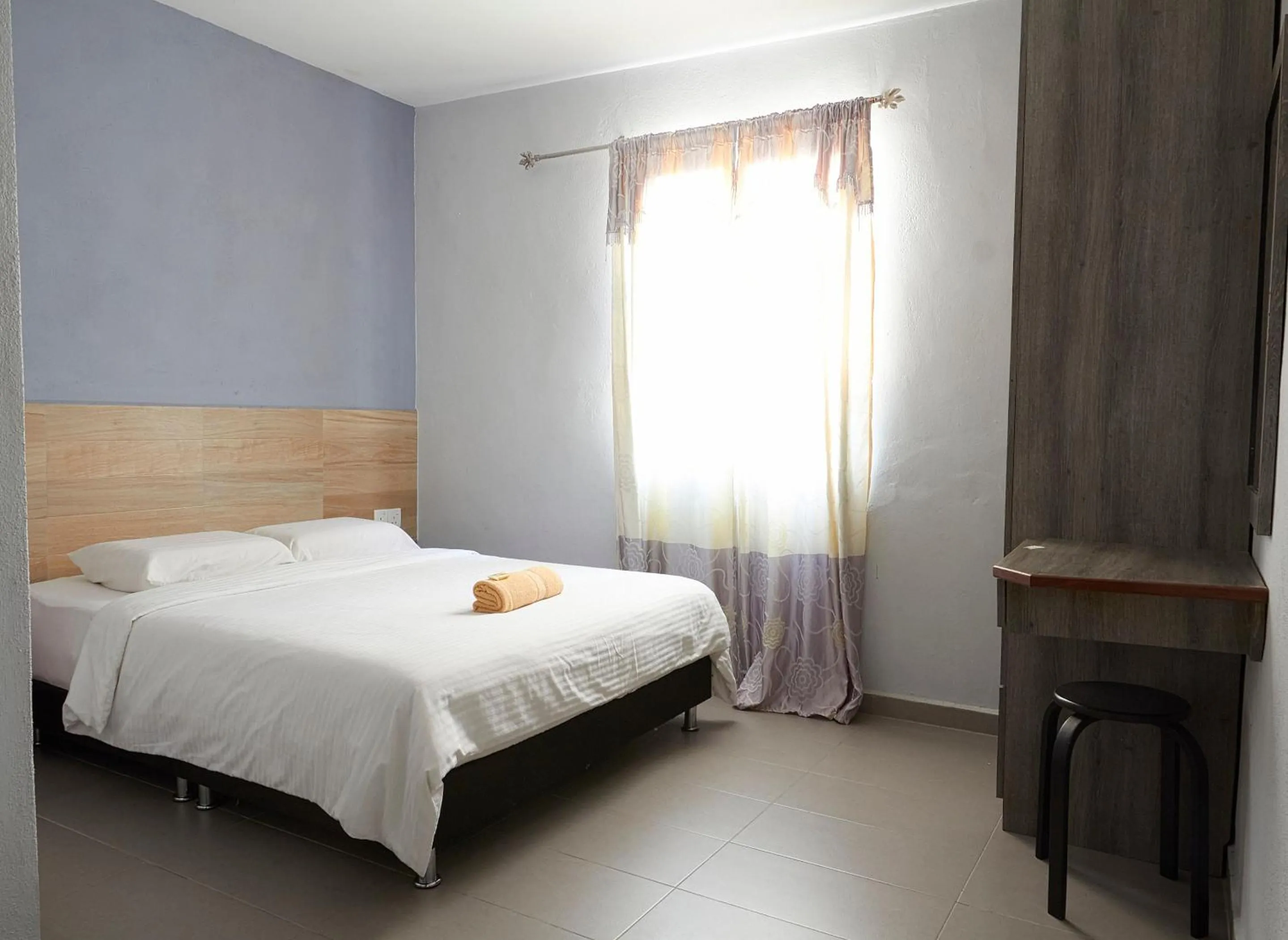 Bed in Corrie Chalet Pantai Cenang Langkawi