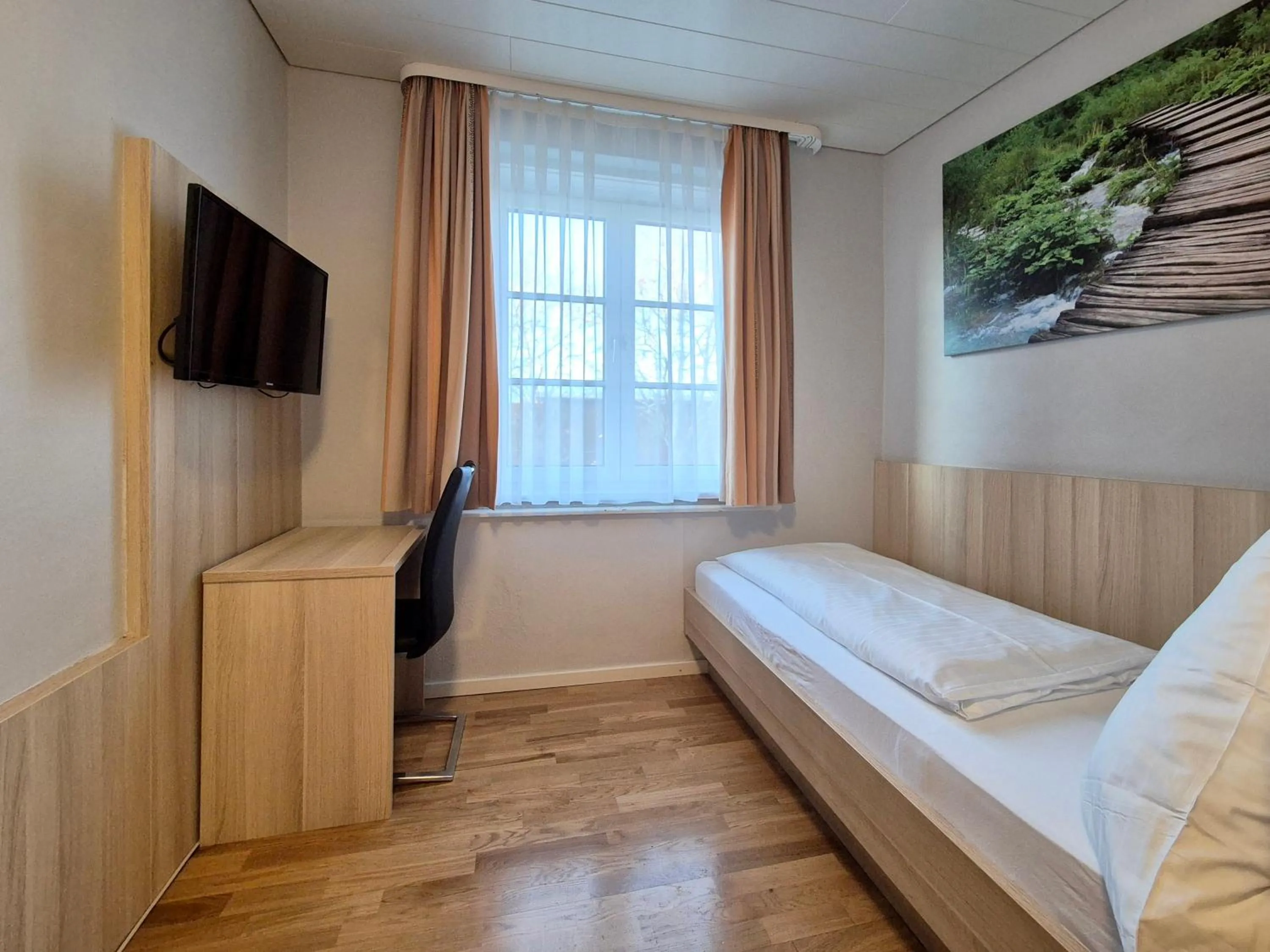 Bed in Hotel Mäuerle